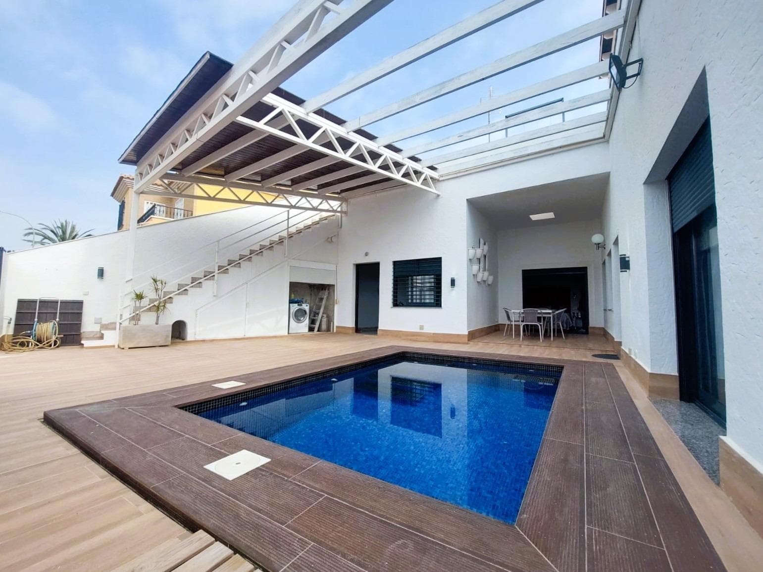 RENT TO BUY AVAILABLE (Contact for more information).. . Fantastic villa on one level, only 400m from the sea in Torre de la Horadada. It has a wonderful courtyard, with parking space (ford with automatic gate), private heated pool with saline water, barbecue area, laundry area and a separate annex, ideal as an office, gym or guest room. . . The villa has a very comfortable layout, with spacious rooms, high ceilings and large windows. From the main entrance we access the hall and from there, a lovely living room. The independent kitchen is very spacious, with an island, dining area and plenty of storage space. Both, the kitchen and the living room have access to the garden.. . The entrance hall also gives access to two spacious bedrooms with fitted wardrobes and a full bathroom, also very spacious. The third bedroom, which is the master bedroom, has a dressing room and a large en-suite bathroom. This bedroom has glass doors with access to the patio and beautiful views of the swimming pool. . . The swimming pool, which is the focal point of the garden/patio, is heated and has salt water.. . To top it all off, this villa has a sun terrace, with sea views, of no less than 170m2! . . It has ducted heating/air conditioning and a beautiful glazed fireplace visible from the living room and kitchen. . . Sold furnished and with white goods. All practically new and of high quality. . . Finally, this fantastic property has access to a private road with parking space for residents.. . Located in a central but very quiet street, close to all amenities and within walking distance to the beautiful beaches of Torre de la Horadada.. . Request a viewing as soon as possible!