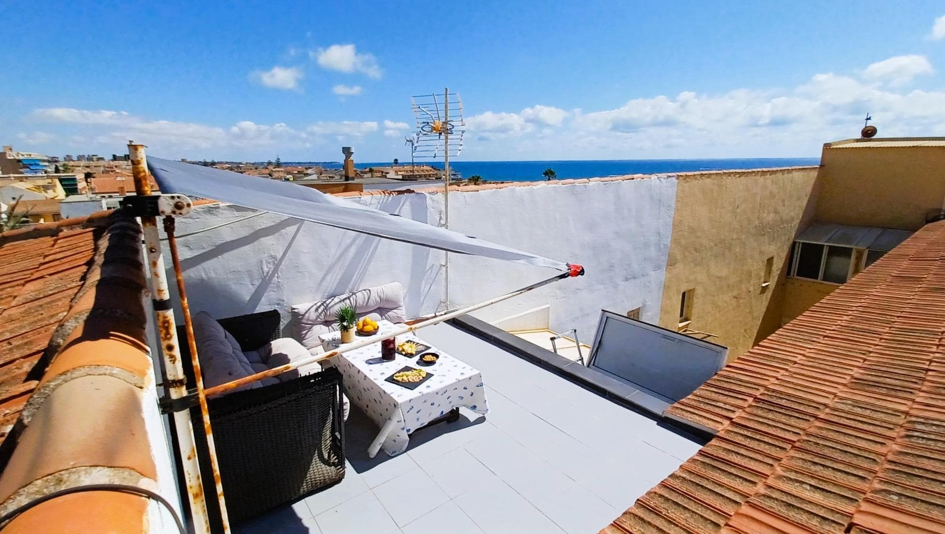 Just 100 metres from Los Jesuitas Beach, right in the heart of Torre de la Horadada, this fully refurbished 82 m2 penthouse combines a prime location with comfortable and well-designed spaces. Surrounded by restaurants, shops, supermarkets and all the necessary amenities, it allows you to enjoy the beach and your daily life without needing to use the car.. . The flat comprises three bedrooms, a full bathroom, a kitchen opening onto the living-dining room, and a terrace with a utility area. Thanks to its layout and bespoke fitted furniture, it offers ample storage space and a pleasant sense of spaciousness. . . It stands out for the quality of its finishes and fittings, featuring top-of-the-range appliances, underfloor heating in the bathroom, heating in the bedrooms, air conditioning and various smart home solutions that provide comfort and functionality.. . The property is bright, benefits from cross-ventilation and features thermal and acoustic insulation, ensuring comfort all year round. Furthermore, the terrace includes a practical outdoor shower, ideal after a day at the beach.. . The building has a lift, a video intercom system and has been recently refurbished. . . A property ready to move into, ideal both as a permanent home and for enjoying holidays by the sea.