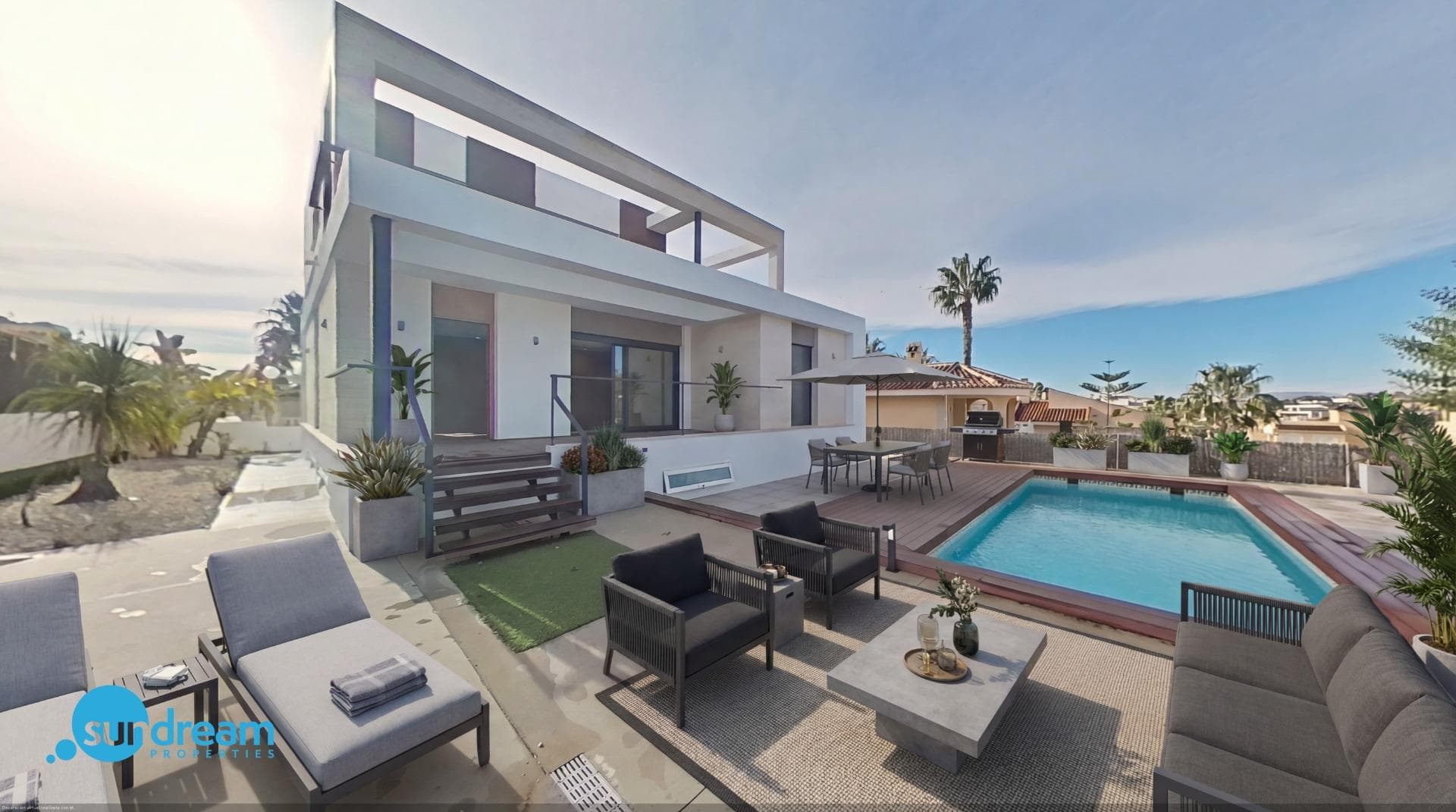 Prime detached Villa in Benijófar’s most sought-after locations Situated in a peaceful and well-established residential area, this elegant detached villa enjoys a prime position in Benijófar, offering privacy, comfort, and fantastic open views of the surrounding landscape. A home thoughtfully designed for modern Mediterranean living, combining quality, space, and tranquillity. The villa offers three bedrooms and two bathrooms, with a standout master suite located on the first floor. This impressive master bedroom features a walk-in dressing area, a stylish modern bathroom, a dedicated study space, and direct access to a large private terrace, ideal for enjoying the views and the Mediterranean climate in complete privacy. The main living area is bright and welcoming, complemented by a modern kitchen equipped with high-quality electrical appliances, perfect for both everyday living and entertaining. The property is offered unfurnished, allowing you to tailor the interiors entirely to your own style. A key highlight is the spacious 53 m² basement with independent access, offering exceptional versatility—ideal as a guest area, home office, gym, cinema room, or additional living space. Outside, the private swimming pool and sunny garden provide an inviting setting to relax or entertain, all while enjoying the open views. The villa is equipped with domotic system, electric shutters, and air conditioning Air Zone, ensuring comfort and efficiency throughout the year. Key features: Prime location in a quiet residential area Fantastic open views of the surroundings Private swimming pool Sunny garden 53 m² basement with separate access Large first-floor master suite with walk-in dressing, modern bathroom, study area, and terrace access Unfurnished High-quality electrical appliances Domotic system Electric shutters Air conditioning Air Zone 3 bedrooms 2 bathrooms (one ensuite) Excellent access to local services and infrastructure An exceptional home for families, couples, or discerning buyers seeking space, views, and modern comfort—offering a refined lifestyle with a genuine holiday feel in the heart of Benijófar.