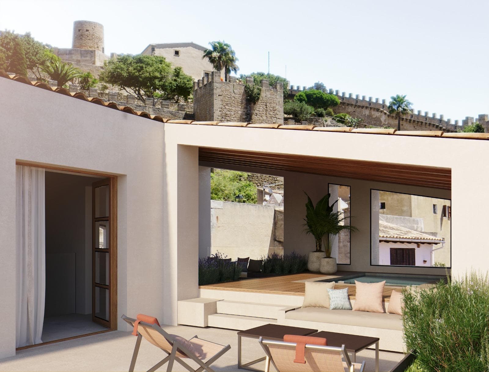 We present you with a spectacular triplex penthouse, fully renovated, located in an old building that was originally the former school of Capdepera. Situated in the heart of the old town of Capdepera, at the foot of the majestic Castle that dominates the area.This property combines the tranquility of an oasis in a medieval setting with the convenience of being just a few minutes' walk from the village center and a 3 km drive from the idyllic beaches of Cala Ratjada.The house has been designed with traditional materials, complying with the latest building and heritage regulations. It is distributed over four levels: basement, ground floor (entrance hall), first floor, and second floor.In the basement, you will find a spacious garage with space for two vehicles. There is also a wine cellar, which can serve different purposes. This floor connects to a refined entrance hall located on the ground floor, from where we can access the first floor via fantastic stairs.The first floor has three double bedrooms, all with en-suite bathrooms, one of which includes a dressing room, ensuring maximum comfort and privacy. Additionally, the rooms have integrated, high-quality wardrobes.On the second floor, there is a spacious and bright living-dining-kitchen area, ideal for family gatherings. From this space, you can access the porch, which features a pool and a terrace. From the porch, we can enjoy charming views of the mountains and the village.On the same floor, we find the kitchen, which is fully equipped and furnished with high-end appliances and materials.The entire property has been designed with the most modern and state-of-the-art finishes. Additionally, it has an aerothermal heating system that ensures energy efficiency. Even though the shutters and windows are made of wood, in compliance with the old town regulations, the glass is Climalit, which ensures sound and thermal insulation, providing a significant improvement in energy savings.The porcelain stoneware flooring adds elegance and distinction, while the kitchen has been furnished with a modern design that exudes sophistication in every detail.Important: The purchase taxes, notary, and property registration fees are not included in the price.If you are looking for a home in a unique setting, combining medieval charm with modern conveniences, don't hesitate to visit it. Additionally, as builders, we offer comprehensive advice for any renovation or customization you may wish to carry out.