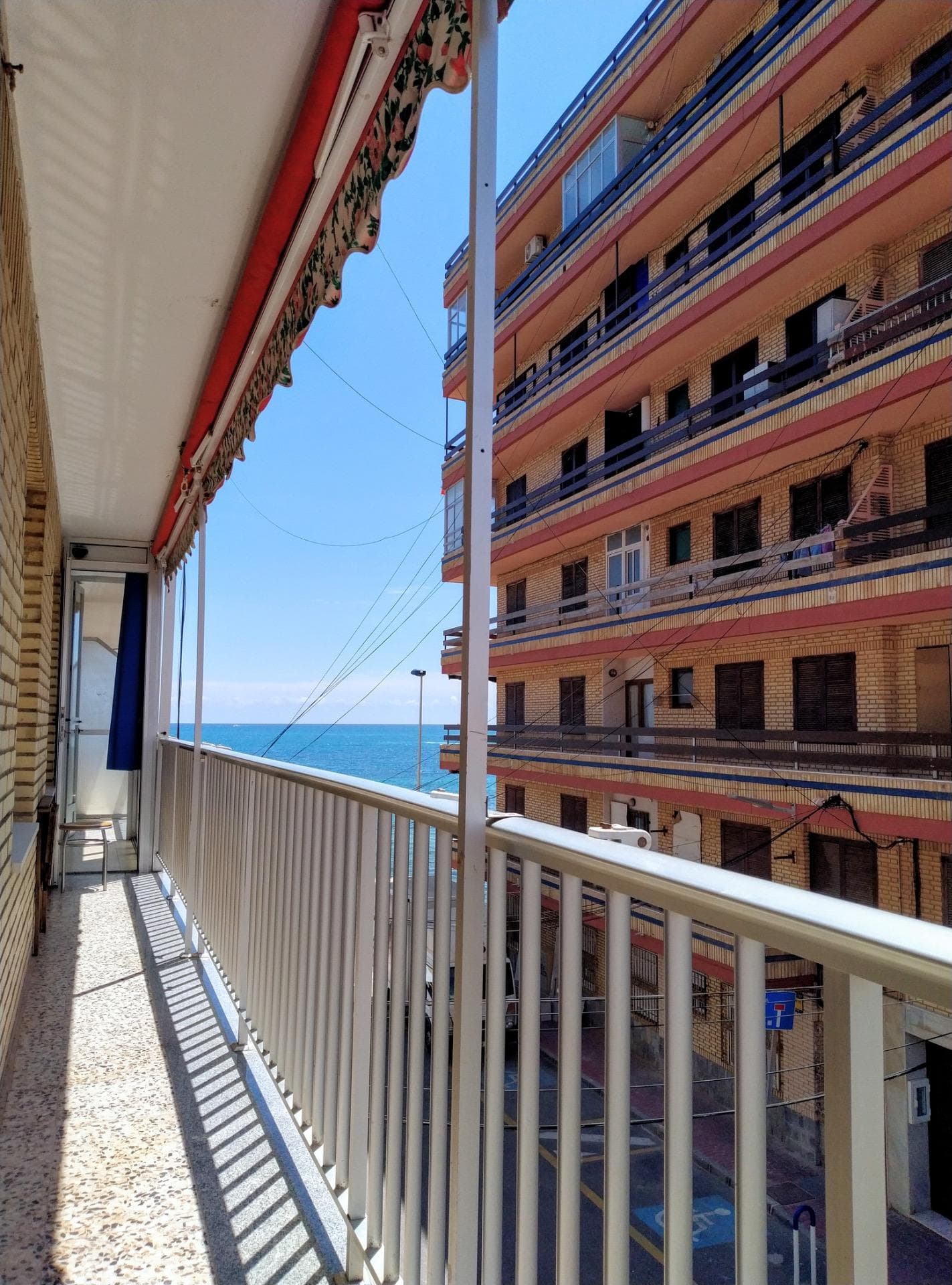 Today we present this fantastic apartment just a few meters from Náufragos Beach, in Torrevieja. The property consists of two bedrooms (the third has been incorporated into the living room), one bathroom, a separate kitchen, and a spacious living-dining room with access to a large 28 m² terrace offering fantastic side sea views. It is being sold fully furnished and equipped, ready to move into. Close to all amenities. Contact us for more information; we will be happy to assist you.