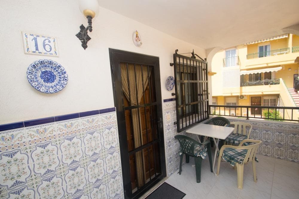 A unique opportunity in Torrevieja, just 150 meters from Playa de la Veleta! We present this magnificent first-floor apartment, designed to offer you comfort, style, and an exceptional quality of life, in one of the best locations on the Costa Blanca. This apartment is functionally and invitingly distributed into 2 spacious bedrooms, a bathroom, a separate kitchen, and a first-floor patio with a large furnished terrace offering unobstructed views. Its east orientation guarantees excellent light and beautiful views. The apartment features a spacious living-dining room and a fully equipped separate kitchen. It is also ready to move into, with all the amenities you need to enjoy the coast. Located in a privileged setting, you will be surrounded by amenities: shops, restaurants, supermarkets, pharmacies, bars, and shopping centers. You will also have easy access to Alicante Airport, just 45 minutes away by car. Shall we schedule your visit?