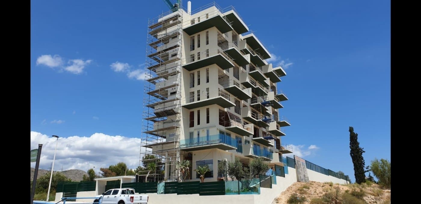 NEW BUILD APARTMENTS IN LA CALA DE FINESTRAT

 New Build residential of 21 apartment in La Cala de Finestrat. 
 This apartments have 1 bedroom, 2 bathrooms, open plan lounge with kitchen and terrace. 
 Residential consists of 8 floors and have communal garden with infinity pool plus hydromassage and recreational areas.
 Underground parking and storage room are optional at an extra cost. 
 The construction will be carried out with top quality materials and a robotic energy saving system, in addition to other technologies such as remote door opening. 

 The complex located 15 minutes walk from Poniente beach, 15 minutes from the "La Marina de Finestrat" shopping centre.
 Alicante airport is 44 km away.