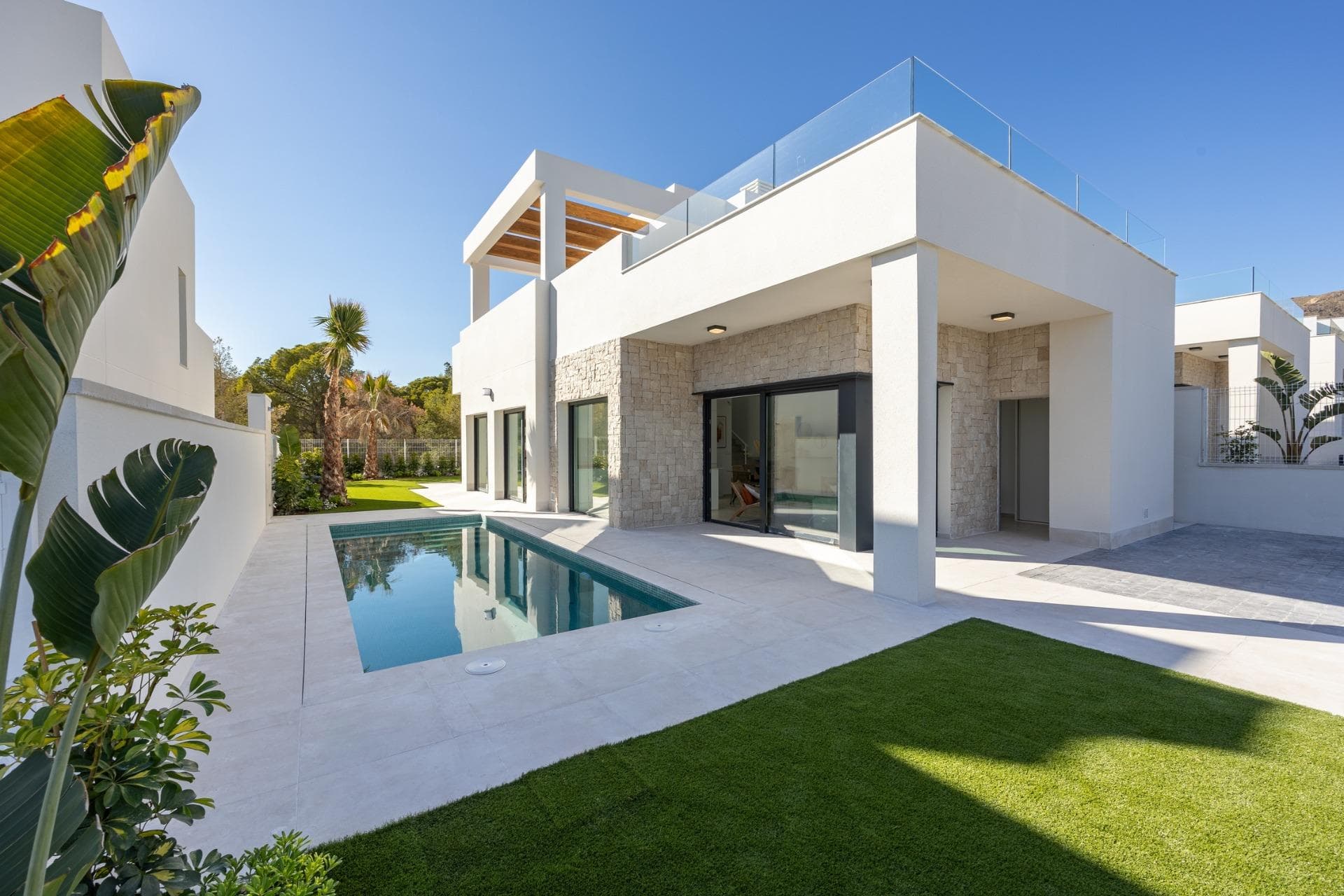 NEW BUILD VILLAS IN FINESTRAT

 New Build residential of 12 villas in Finestrat, in Sierra Cortina – one of the best urbanizations on Costa Blanca.

 Villas build over 2 floors, has 3 bedrooms, 2 bathrooms, open plan kitchen with lounge, build-in wardrobes, terrace and solarium, private garden with the pool and 2 parking spaces..

 Residential located in the Sierra Cortina resort complex, ​next to two golf courses, theme parks, a large shopping centre and a few minutes from the beaches of Benidorm.

 Finestrat located in the Marina Baixa region of the Costa Blanca, close to neighbouring Benidorm and about 40 kilometres from the city of Alicante and the international airport.

 The village is situated on the mountainside of Puig Campana and offers beautiful views of the mountains, the coast and the Mediterranean Sea.