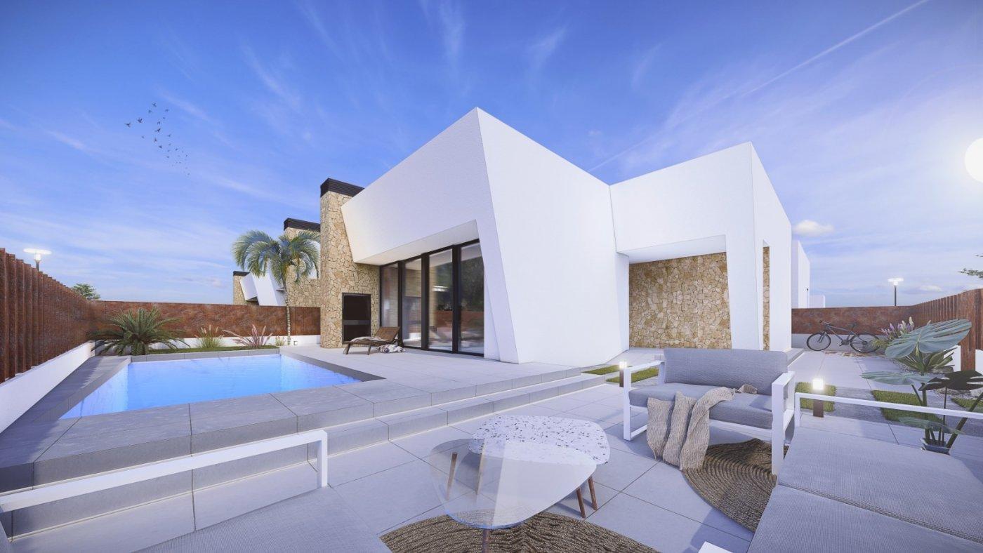 NEW BUILD VILLAS IN SAN PEDRO DEL PINATAR

New Build residential of 6 villas in san Pedro del Pinatar.

New Build villas with 3 bedroom, 2 bathrooms, with wonderful private swimming pool, large roof solarium, sun kissed front, side and rear terraces and off road parking.

The villas are designed on one level with elevated ceiling to the lounge/kitchen area, each villa boasts wrap around terrace / sun zones on the ground floor and a large private solarium on the first floor to enjoy hours of sunshine, all year round.

3 bedrooms (master bedroom en-suite) and separate family bathroom… designed with a contemporary ‘eco’ style and open plan concept, comprising a fitted kitchen and lounge-dining room, a private summer patio area.

The villas are equipped with: private swimming pool with outdoor shower, solarium, terrace areas, fully fitted kitchen and bathrooms with led mirror, lined wardrobes with drawers, interior/exterior lighting installed air-conditioning, electric operated shutters in each room.

The development is located in a residential area of San Pedro del Pinatar, surrounded by services, parks, sports facilities, near several Golf Courses such as Roda Golf, Lo Romero and La Serena Golf and only 5 minutes from the stunning beaches of the Mediterranean or the Mar Menor.

Murcia/Corvera airport is 30 minutes away and Alicante airport is an hour drive away.