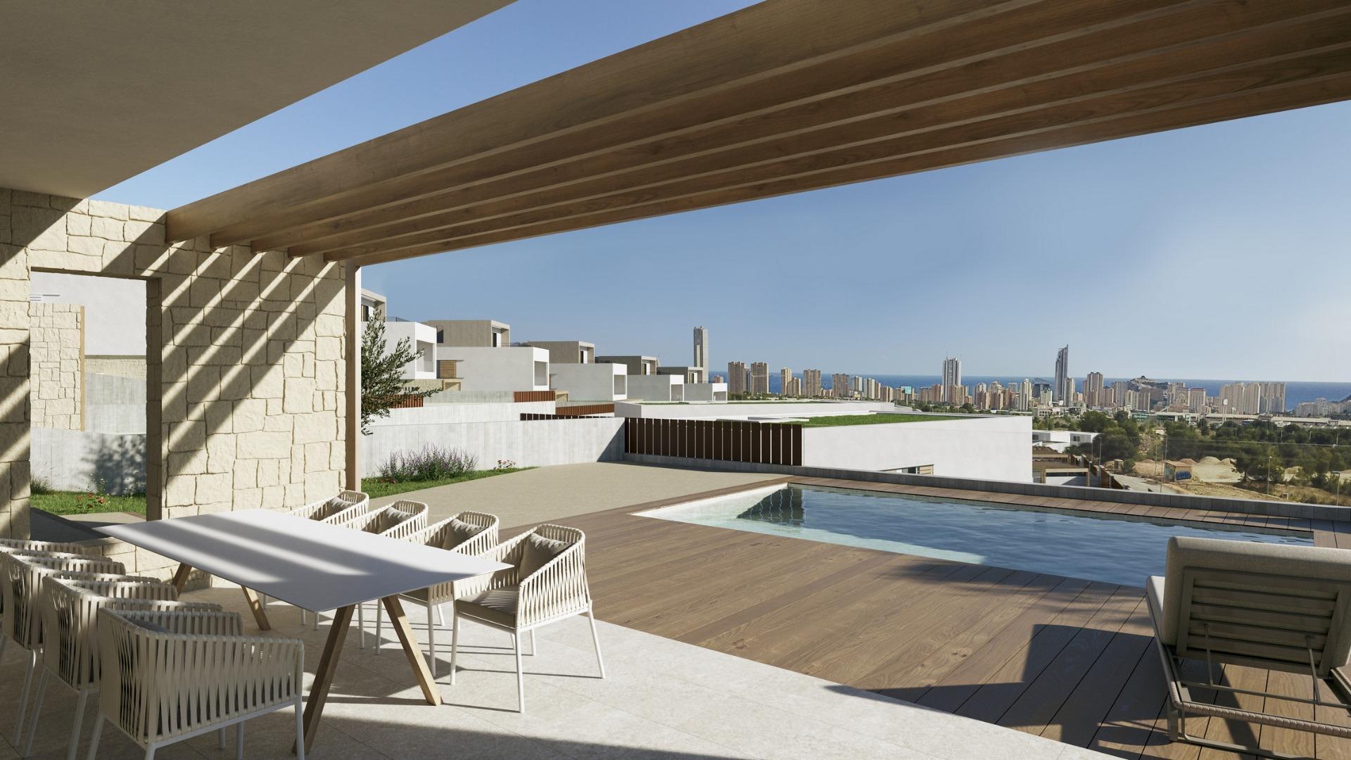 NYBYGGEDE VILLAER I FINESTRAT

Nybyggede moderne villaer i Finestrat.

Villaer med 4 soverom og 4 bad, åpen kjøkkenløsning med stue, terrasse med fantastisk utsikt over Benidorm, privat hage med svømmebasseng og parkeringsplass.

Den laterale hagen, utsmykket med kaktus og hvit grus, forbinder adkomstnivå 1 med hovedetasjen (nivå O).

Bruken av naturgress i resten av terrenget presenteres som et ekstra innslag gjennom et omhyggelig designet landskapsprosjekt.

Hvert nivå er fremhevet med et materiale som fremhever dets essens. Nivå O er kledd i naturlig kalkstein som gir støtte til hele strukturen. 
Nivå 1, med sin monolayer-finish og skodder i tre, beskytter den mest intime delen av boligen. 
Nivå 2, der hovedsoverommet ligger, har utgang til en romslig terrasse og er kledd med strukturert monolag i en varm tone.

Middelhavsestetikken oppnås gjennom en perfekt sammensmelting av tradisjon, moderne arkitektur og natur.

Finestrat ligger i Marina Baixa-regionen på Costa Blanca, i nærheten av nabobyen Benidorm og ca. 40 kilometer fra byen Alicante og den internasjonale flyplassen.

Landsbyen ligger i fjellsiden av Puig Campana og har vakker utsikt over fjellene, kysten og Middelhavet.

Benidorm ligger bare en fem minutters kjøretur unna, og her finner du alt du trenger av butikker, barer, restauranter, supermarkeder, banker, apotek og flere private internasjonale skoler.