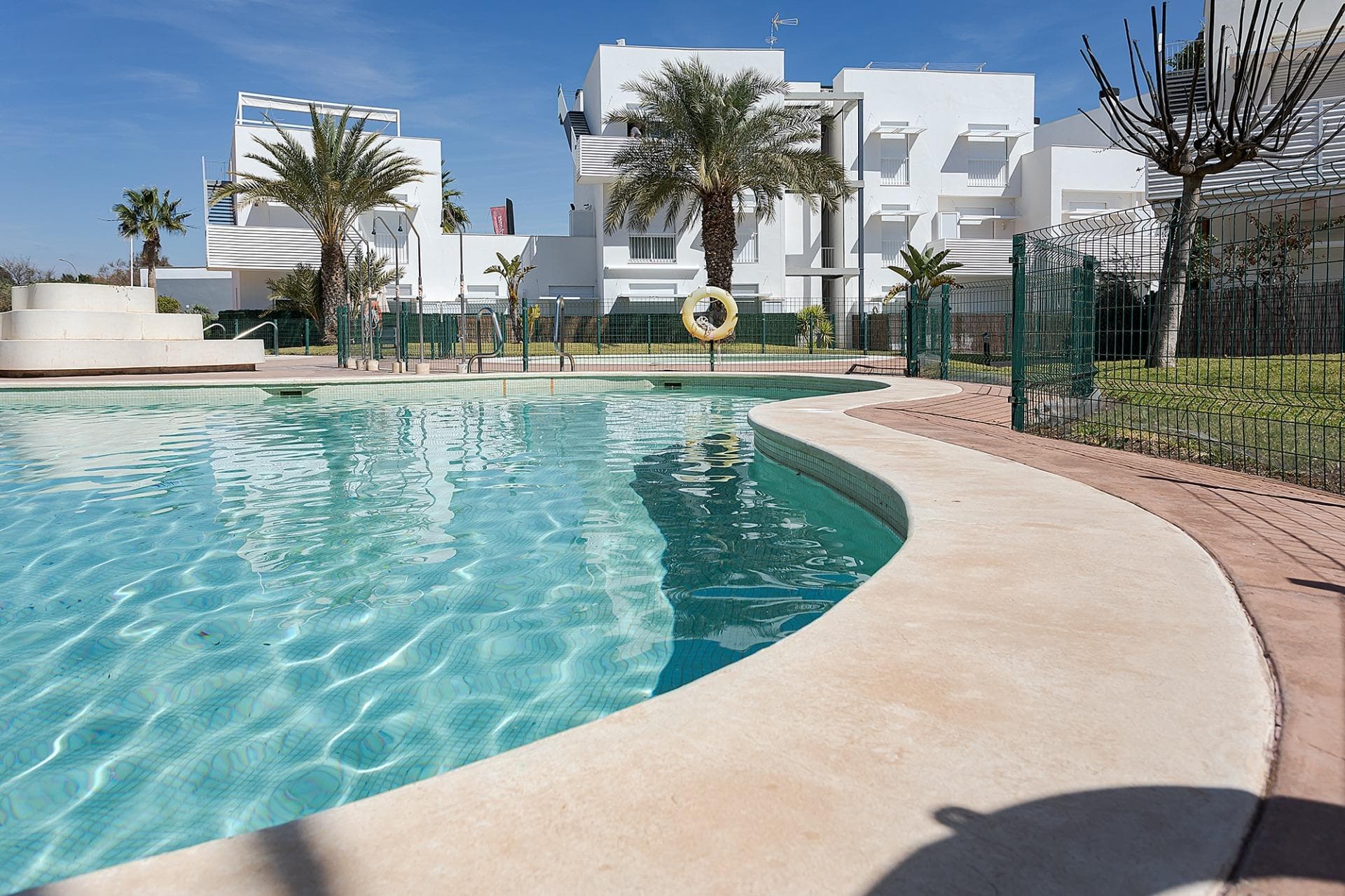 NEW BUILD RESIDENTIAL COMPLEX IN VERA

 New Build residential of apartments in Vera just 400m from the huge Vera beach named "El Playazo".

 The typologies are ground floor with two private gardens, one in each orientation, which allows you to enjoy sun or shade whenever you want depending on the time of day or the season of the year. The first floors have terraces and the penthouses have large solariums.

 All the apartments have extra height ceilings (2.95 m) providing a great feeling of spaciousness.

 The kitchen comes fully furnished and equipped integrated with the living-dining area with a bar area. 

 The doors and fitted wardrobes are lacquered in white and the floor is made of laminated wood. 

 The hot-cold air conditioning and the hot water are generated by a state-of-the-art DAIKIN Aerothermal device, a technology that saves up to 70% of electricity consumption compared to traditional systems. 

 All bathrooms come with a shower instead of a bathtub, with recessed mirrors and also with a stone countertop and glass partition in the main bathroom. 

 The blinds in the living room and master bedroom are electric, hermetically sealed and with adjustable slats. 

 The gardens and solarium are delivered with the floors finished combining artificial grass and a beautiful paving imitating wood. 

 Each house includes a private outdoor parking space.

 Each block of the promotion has an independent elevator.

 Both the buildings and the apartments have a series of bioclimatic architecture characteristics (orientation, insulation, windows and shutters, pergolas) that allow optimal natural regulation of ventilation, temperature and light throughout the different seasons of the year. 

 The communal areas are made up of pedestrian squares and green areas, with a large swimming pool for adults and another for children in the central square. 

 The entire urbanization is free of architectural barriers for the disabled. Here tranquillity and relaxation are guaranteed. 

 Vera is one of the best naturist places in Europe, recognized for the quality and purity of their waters.

 It offers six kilometres of beaches (Las Marinas-Bolaga, Puerto Rey, El Playazo, Quitapellejos).

 Vera bordering with the famous tourist destinations such as Mojacar and the Almanzora Caves.

 Residential complex located about 1,5 hour drive away from Murcia - Corvera airport and about 2 hours away from Alicante airport.
