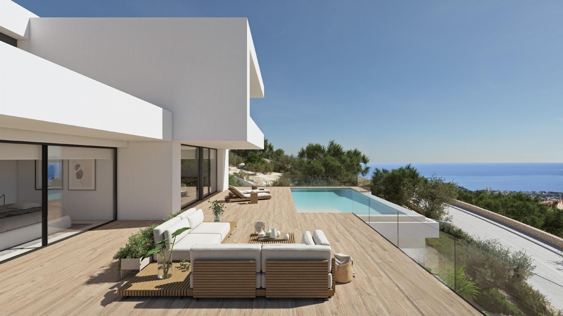 NEW BUILD LUXURY VILLA IN CUMBRE DEL SOL

New Build luxury villa with spectacular sea views is ideal to live in with the family or to enjoy with friends. It is located at the top of Puig de la Llorençà, in the Residential Cumbre del Sol dominating over the residential area and with an unbeatable sea view. A unique and exclusive place in the North Costa Blanca region.

Its modern architecture, based on straight lines, combined with the Mediterranean style blends perfectly with its surroundings. This villa has been completely designed to enhance functionality and comfort, without cutting back an ounce on design. The villa is surrounded by a large garden with indigenous plants and elements. A feature that particularly stands out is the natural stone walls.

The villa has a private parking area on the top floor for up to two vehicles, since access to the villa is located on the same floor.

Once inside, we will find two bedrooms with a private bathroom and terrace to be able to enjoy the sea views at any time of the day.

We go down to the main floor where the main suite of this villa is located. A very spacious room with a modern walk-in dressing room with large wardrobes. The room´s private bathroom will surprise you, starting with its large size. Its equipment, based on designer bathroom fittings from renowned brands, together with the possibility of taking baths with sea views, make it one of the most exclusive places of this villa.

The villa has a kitchen equipped with top brand electrical appliances and a large island where you can cook with your family or with friends on long days. The living room provides a warm atmosphere thanks to the wide open spaces and natural light, a perfect place to just relax.

And to finish on this floor, an extraordinary infinity pool on the terrace, from where you can enjoy refreshing swims while contemplating the immensity of the sea.

On this same terrace we can find a covered area, which will allow you to enjoy the outdoors practically all year round, thanks to the mild climate of the area.

The basement is a wide-open empty space ready for you to customize it however you like. It could be turned into a fourth bedroom, an office, a games room or even a gym. The options are endless.

The villa is equipped to the standards of it. It has high range services: a furnished kitchen with designer furniture, top brand electrical appliances, under floor heating…, take a look at the quality report, it will no leave you indifferent.

All these features make this Villa a perfect option to enjoy a Mediterranean lifestyle.
If you are looking for a home that is different, Villa provides the additional space to that will make your day-to-day special.