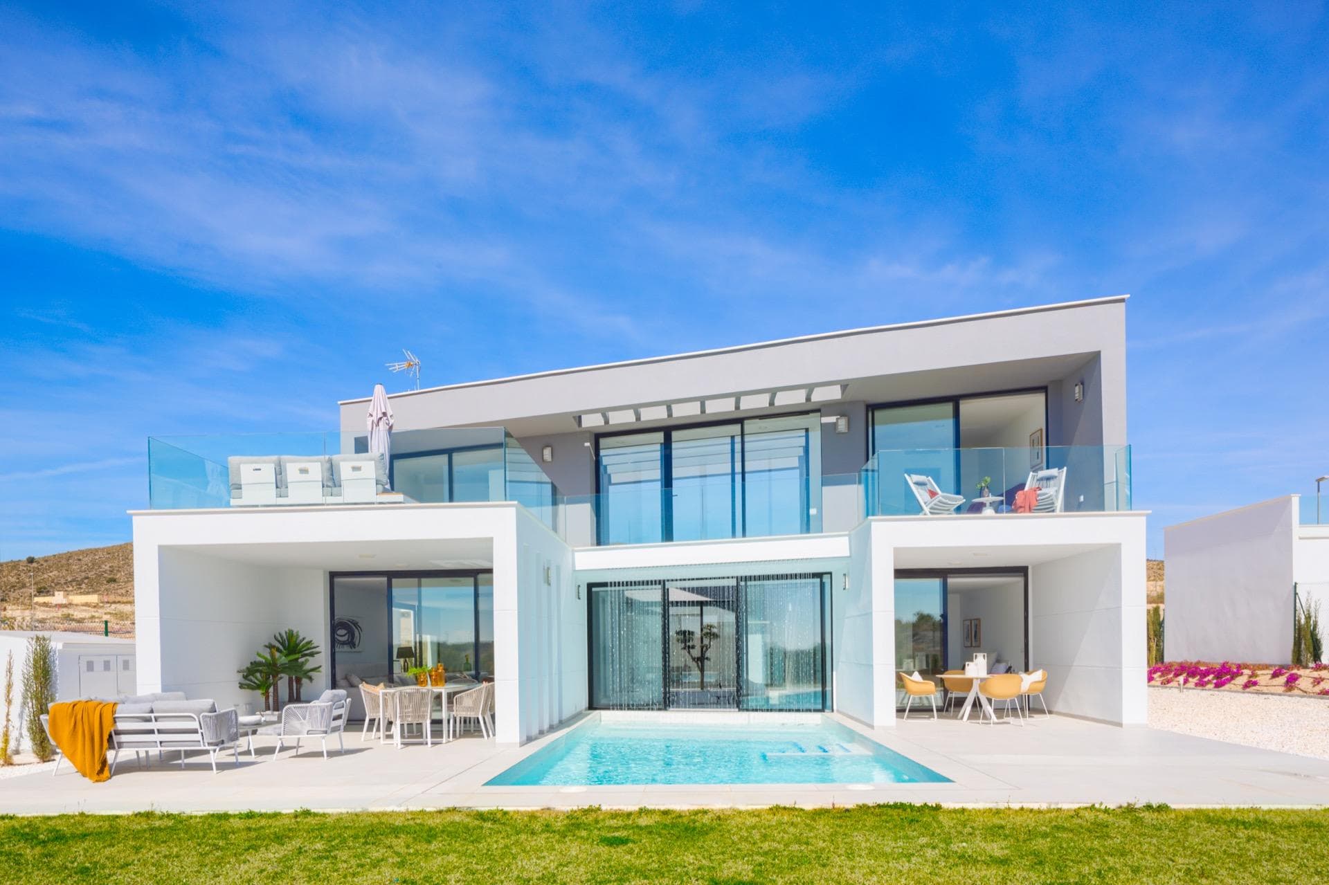 NEW BUILD VILLAS IN ALTAONA GOLF RESORT, MURCIA

 New Build residential of beautiful villas in Altaona Golf resort, Murcia.

 Located in a privileged environment where we can live quietly, in contact with nature and the mountains, we achieve quality of life, fresh air and open spaces.

 New Build Modern villa distributed over 2 floors, with 4 bedrooms, 4 bathroom with built in wardrobes and terraces, open plan kitchen with living room with large windows and direct access to the garden with pool and parking space.

 Exclusive New Build residential located in Altaona Golf just 15 minutes by car from the center of Murcia capital and 20 minutes from the beaches you can enjoy the tranquility and security offered by the Golf Course that has 18 holes and the comfort to live close to all services.

 Murcias airport Corvera only 15 minutes drive away.