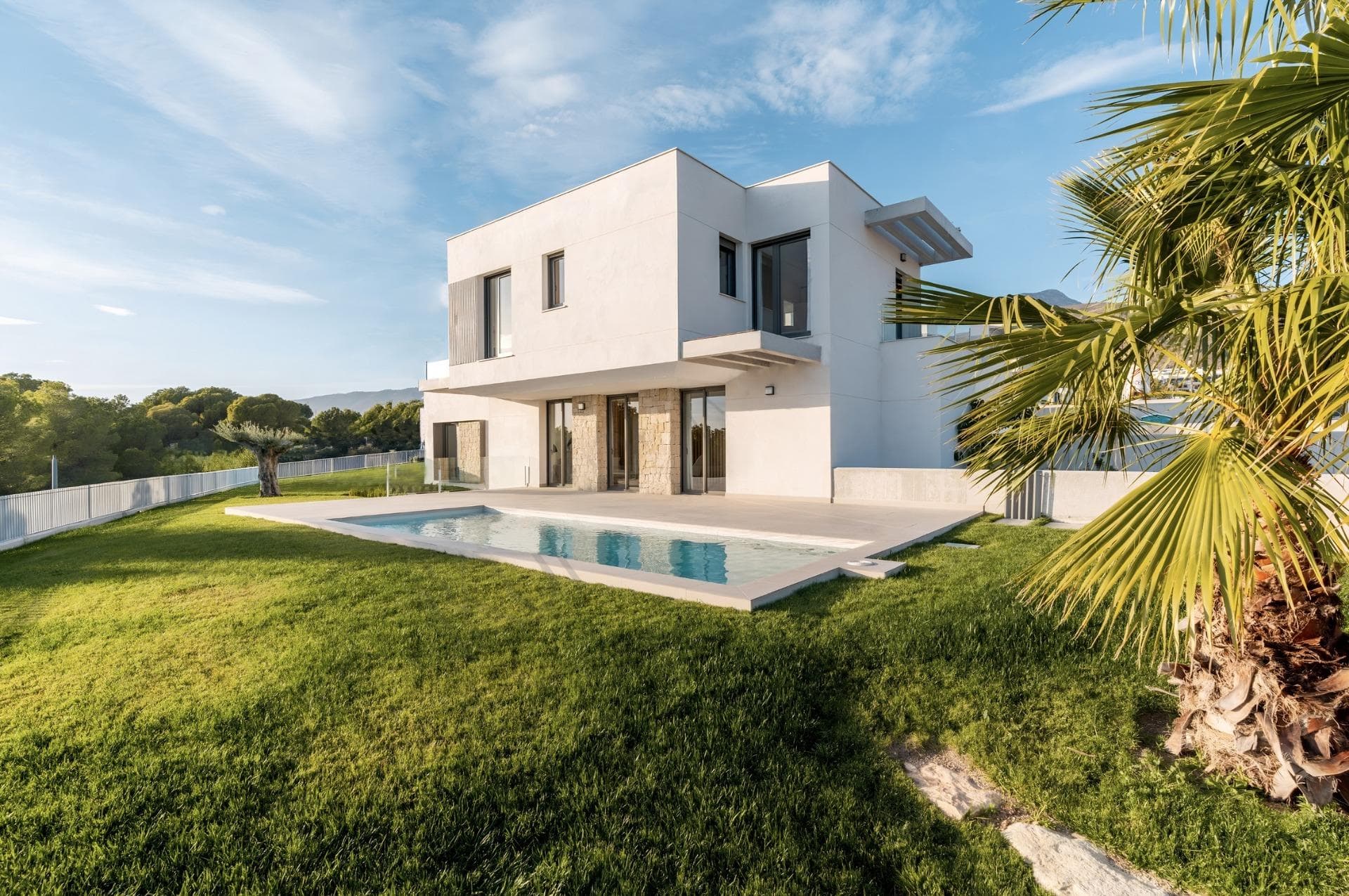 NEW BUILD VILLAS IN FINESTRAT

 New Build residential of 30 independent villas of avant-garde design in Sierra Cortina, Finestrat, in the heart of the Costa Blanca, a luxury development where you can enjoy a unique environment of tranquillity.

 Villas build over 2 floors, has 3 bedrooms, 3 bathrooms, guest toilet, open plan kitchen with lounge, build-in wardrobes, terraces, private garden with the pool and basement with the garage

 Residential located in the Sierra Cortina resort complex, ​next to two golf courses, theme parks, a large shopping centre and a few minutes from the beaches of Benidorm.

 Finestrat located in the Marina Baixa region of the Costa Blanca, close to neighbouring Benidorm and about 40 kilometres from the city of Alicante and the international airport.

 The village is situated on the mountainside of Puig Campana and offers beautiful views of the mountains, the coast and the Mediterranean Sea.
