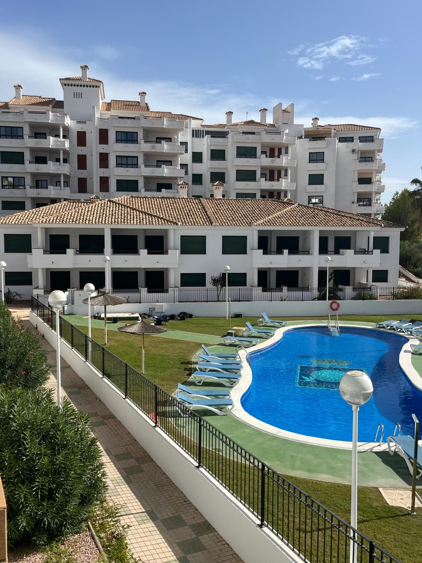 Key Ready Apartments for Sale in Lomas de Campoamor, Orihuela Costa

Discover the Exclusive Lomas de Campoamor Residential Complex
Situated in the sought-after area of Lomas de Campoamor, Orihuela Costa, this key-ready residential complex offers the perfect blend of comfort, convenience, and style. Built in 2008 but never lived in, the final units are now available for sale, presenting a unique opportunity to own a brand-new property in a prime consolidated location.

Spacious Apartments with Modern Features
These ready-to-move-in apartments boast 2 bedrooms and 2 bathrooms with expansive terraces, perfect for enjoying the sunny Mediterranean climate. Each apartment features a fully furnished kitchen with upper and lower cabinets, a dedicated utility area, and pre-installation for air conditioning. Additional highlights include:

Double-glazed lacquered aluminium windows with roll-up blinds.
Reinforced main entrance door for enhanced security.
Marble bathroom countertops.
Gas installation for heating, hot water, and kitchen needs.
Pre-installation of radiator heating.

Community Amenities for Relaxed Living
The residential complex offers excellent communal facilities, including a beautifully landscaped garden and a large communal swimming pool, ideal for relaxation and socializing.

Prime Location with Proximity to Key Attractions
Located next to the prestigious Real Club de Golf Campoamor, these apartments are perfect for golf enthusiasts. The nearby La Fuente Commercial Centre is just a short walk away, providing easy access to restaurants, cafes, shops, and essential services.

Orihuela Costa’s Blue Flag Beaches: Only a 10-minute drive (approx. 5 km) to stunning sandy shores.
Golf Courses: Several renowned golf courses, including Villamartín and Las Ramblas, are within a 5 km radius.
Airports: Alicante Airport and Murcia’s Corvera Airport are both a convenient 40-minute drive (approx. 55 km).
Shopping Centers: The popular Zenia Boulevard Shopping Centre is only 8 km away, offering top retail and dining experiences.

Ideal for a Second Home or Permanent Living
With its unbeatable location, excellent amenities, and close proximity to beaches, golf, and major transport hubs, these apartments are perfect for a second home or full-time residence.

Don’t Miss Out – Contact Us Today
This is a rare chance to secure a key-ready apartment in Lomas de Campoamor. Enquire now to arrange a viewing and take the first step toward owning your dream property in Orihuela Costa!