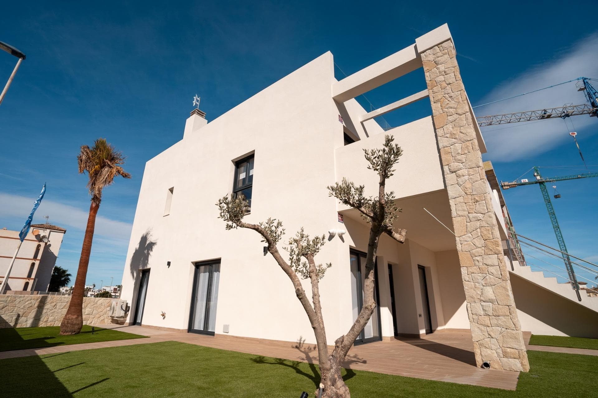 New build bungalows in Pilar de la Horadada

Modern homes close to the beach
Discover this exclusive new build residential complex in Pilar de la Horadada, offering bungalows just 2 km from the beach. Designed for comfort and style, these homes are an excellent opportunity to enjoy life on the Costa Blanca.

Spacious and stylish homes
This development offers 2 or 3 bedroom homes with 2 bathrooms and private parking. Choose from:
Ground floor bungalows with private garden.
Top floor bungalows with private solarium.

Each property is built with high-quality materials and modern finishes, including:
Ducted air conditioning pre-installation.
Aluminum exterior carpentry, double glazing, and injected aluminum shutters.
Security entrance door for added peace of mind.
Aerothermal system for efficient hot water production.
Built-in wardrobes in bedrooms.
Fully equipped bathrooms with furniture and shower screens.

Exclusive Community Features
This private residential complex boasts a beautiful communal pool and landscaped gardens, creating an ideal space for relaxation. Located just outside the town center, residents can walk to supermarkets, restaurants, bars, schools, and other essential services.

Prime Location in Pilar de la Horadada
Pilar de la Horadada is a charming Spanish town in the southernmost part of the Costa Blanca. It offers a vibrant main street with numerous shops, supermarkets, restaurants, and picturesque squares.

The stunning beaches of Torre de la Horadada and Mil Palmeras are only 5 minutes away, featuring fine golden sand a scenic promenade. The town also offers well-developed cycling paths and walking trails, along with a variety of sports activities.

Convenient Access to Key Destinations
Lo Romero Golf Course – 5 km (10-minute drive).
Corvera Airport (Murcia) – 40 km (40-minute drive).
Alicante Airport – 55 km (55-minute drive).
Shopping Centers (La Zenia Boulevard) – 15 km (15-minute drive).
Torre de la Horadada Marina – 3 km (5-minute drive).

Secure Your Dream Home Today
Don't miss this fantastic opportunity to own a brand-new home in a prime location. Contact us today for more information and to arrange a visit!