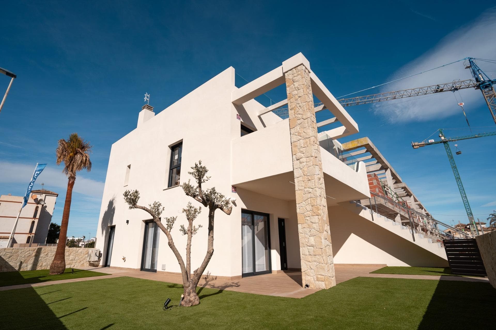 New build bungalows in Pilar de la Horadada

Modern homes close to the beach
Discover this exclusive new build residential complex in Pilar de la Horadada, offering bungalows just 2 km from the beach. Designed for comfort and style, these homes are an excellent opportunity to enjoy life on the Costa Blanca.

Spacious and stylish homes
This development offers 2 or 3 bedroom homes with 2 bathrooms and private parking. Choose from:
Ground floor bungalows with private garden.
Top floor bungalows with private solarium.

Each property is built with high-quality materials and modern finishes, including:
Ducted air conditioning pre-installation.
Aluminum exterior carpentry, double glazing, and injected aluminum shutters.
Security entrance door for added peace of mind.
Aerothermal system for efficient hot water production.
Built-in wardrobes in bedrooms.
Fully equipped bathrooms with furniture and shower screens.

Exclusive Community Features
This private residential complex boasts a beautiful communal pool and landscaped gardens, creating an ideal space for relaxation. Located just outside the town center, residents can walk to supermarkets, restaurants, bars, schools, and other essential services.

Prime Location in Pilar de la Horadada
Pilar de la Horadada is a charming Spanish town in the southernmost part of the Costa Blanca. It offers a vibrant main street with numerous shops, supermarkets, restaurants, and picturesque squares.

The stunning beaches of Torre de la Horadada and Mil Palmeras are only 5 minutes away, featuring fine golden sand a scenic promenade. The town also offers well-developed cycling paths and walking trails, along with a variety of sports activities.

Convenient Access to Key Destinations
Lo Romero Golf Course – 5 km (10-minute drive).
Corvera Airport (Murcia) – 40 km (40-minute drive).
Alicante Airport – 55 km (55-minute drive).
Shopping Centers (La Zenia Boulevard) – 15 km (15-minute drive).
Torre de la Horadada Marina – 3 km (5-minute drive).

Secure Your Dream Home Today
Don't miss this fantastic opportunity to own a brand-new home in a prime location. Contact us today for more information and to arrange a visit!