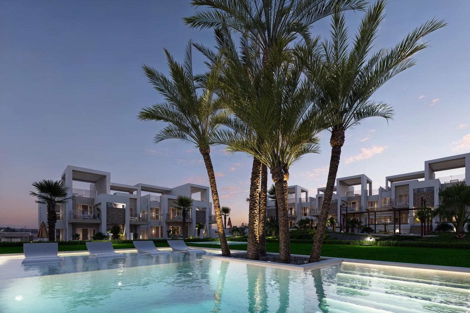 Exclusivas Viviendas de Obra Nueva en Lo Marabú, Ciudad Quesada

Diseño Moderno y Máximo Confort en un Entorno Mediterráneo
Descubra este espectacular complejo residencial en Lo Marabú, Ciudad Quesada, compuesto por 80 viviendas de 2 y 3 dormitorios con 2 baños. Diseñadas con un enfoque moderno y eficiente, estas propiedades ofrecen amplias terrazas, ventilación cruzada y acabados de alta calidad para maximizar el confort y la eficiencia energética.

Las viviendas en planta baja cuentan con jardines privados, mientras que las de la planta alta disponen de soláriums privados con preinstalación para jacuzzi y ducha exterior. Además, el residencial dispone de piscinas comunitarias rodeadas de jardines, creando un ambiente perfecto para el relax y la convivencia.

Características de Alta Calidad para un Estilo de Vida Exclusivo
Cada vivienda ha sido diseñada para ofrecer el máximo confort, con materiales de primera calidad y un diseño contemporáneo:

Amplios ventanales correderos de aluminio con rotura de puente térmico.
Persianas motorizadas para mayor comodidad.
Cristales Climalit 4+4/14/4+4 para aislamiento térmico y acústico.
Puerta de entrada acorazada con cerradura de seguridad.
Cocinas totalmente amuebladas con electrodomésticos incluidos.
Baños con muebles, espejos y mamparas de ducha.
Sistema de aerotermia de 150L para agua caliente.
Instalación completa de aire acondicionado por conductos (frío/calor).
Iluminación en todas las estancias ya incorporada.
Plaza de parking incluida.

Gracias a su diseño pasante de doble fachada, las viviendas ofrecen ventilación natural cruzada, proporcionando frescor en verano y reduciendo el consumo energético en climatización.

Ubicación Privilegiada en Ciudad Quesada
Lo Marabú es una exclusiva zona residencial dentro de Ciudad Quesada (Rojales), rodeada de espacios naturales y con todos los servicios a su alcance. La urbanización se encuentra muy cerca de las Lagunas Saladas de La Mata y Torrevieja, un entorno ideal para disfrutar de la naturaleza y mejorar el bienestar.

Desde su nueva vivienda, tendrá acceso rápido a los principales puntos de interés de la zona:

Playas de Guardamar del Segura y Torrevieja – 10 km (15 minutos en coche).
Aeropuerto de Alicante-Elche (ALC) – 38 km (35 minutos en coche).
Aeropuerto de Murcia-Corvera (RMU) – 65 km (50 minutos en coche).
Campos de golf de prestigio – A menos de 5 km.
Centros comerciales y restaurantes – A pocos minutos.
Acceso rápido a las carreteras AP-7 y N-332, conectando con toda la Costa Blanca.

Un Hogar Perfecto para Disfrutar del Mediterráneo
Con su combinación de diseño moderno, ubicación estratégica y entorno natural excepcional, estas viviendas en Lo Marabú son ideales tanto para residencia permanente, casa de vacaciones o inversión inmobiliaria.

No pierda esta oportunidad única. Contáctenos hoy mismo para más información o para concertar una visita a su futura vivienda en Ciudad Quesada.
