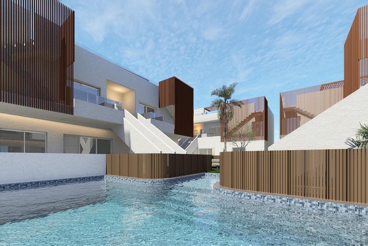 Bungalows de Obra Nueva con Piscina Comunal en Pilar de la Horadada - Costa Blanca Sur

Modernas Residencias Cerca de la Playa y del Centro del Pueblo
Descubra esta exclusiva promoción de obra nueva de 16 modernos bungalows situada en Pilar de la Horadada, un encantador pueblo en la parte más meridional de la Costa Blanca. El complejo residencial ofrece viviendas de 2 ó 3 dormitorios y 2 baños totalmente equipadas, diseñadas para combinar comodidad, funcionalidad y estilo mediterráneo.

La urbanización está situada a sólo 3,5 km de las playas de Torre de la Horadada, y a poca distancia del centro de la ciudad, donde encontrará supermercados, restaurantes, tiendas y todos los servicios esenciales.

Características de primera calidad y diseño funcional
Cada bungalow está construido con materiales de calidad y diseñado para vivir todo el año o disfrutar de las vacaciones. Las características clave incluyen:

Unidades de planta baja con jardín privado
Unidades de planta alta con solarium privado y cocina de verano
Cocina totalmente amueblada con electrodomésticos incluidos
Armarios empotrados con cajoneras
Baños modernos con duchas efecto lluvia, espejos y mamparas
Preinstalación de aire acondicionado por conductos
Sistema de agua caliente aerotérmica de 110 litros para una mayor eficiencia energética
Iluminación exterior e interior (excluyendo elementos decorativos)
Carpintería exterior de aluminio con rotura de puente térmico y doble acristalamiento
Plaza de aparcamiento asignada para cada unidad
Piscina comunitaria para residentes

Estas viviendas son ideales para aquellos que buscan una propiedad fácil de mantener cerca de la costa, perfecta para vivienda permanente, vacaciones o como inversión para alquiler a corto o largo plazo.

Ubicación ideal para un relajado estilo de vida mediterráneo
Pilar de la Horadada ofrece un entorno tranquilo pero vibrante con un fuerte sentido de comunidad. El pueblo está bien comunicado y es conocido por su amplia avenida principal, sus tiendas de artesanía local y sus numerosos cafés y bares de tapas. La zona cuenta con una excelente red de carriles bici y rutas de senderismo, además de una gran variedad de instalaciones deportivas y actividades durante todo el año.

Distancias clave:
Playas de Torre de la Horadada y Mil Palmeras - 3. 5 km (5 min en coche)
Campo de Golf Lo Romero - 7 km (10 min en coche)
Centro Comercial La Zenia Boulevard - 15 km (15 min en coche)
Aeropuerto de Murcia (Corvera) - 40 km (40 min en coche)
Aeropuerto de Alicante - 55 km (55 min en coche)

Asegure su lugar en la Costa Blanca
Tanto si busca un refugio vacacional, una propiedad de inversión o su nuevo hogar bajo el sol, estos elegantes bungalows en Pilar de la Horadada son una excelente elección. Póngase en contacto con nosotros hoy mismo para obtener más información o para programar una visita.