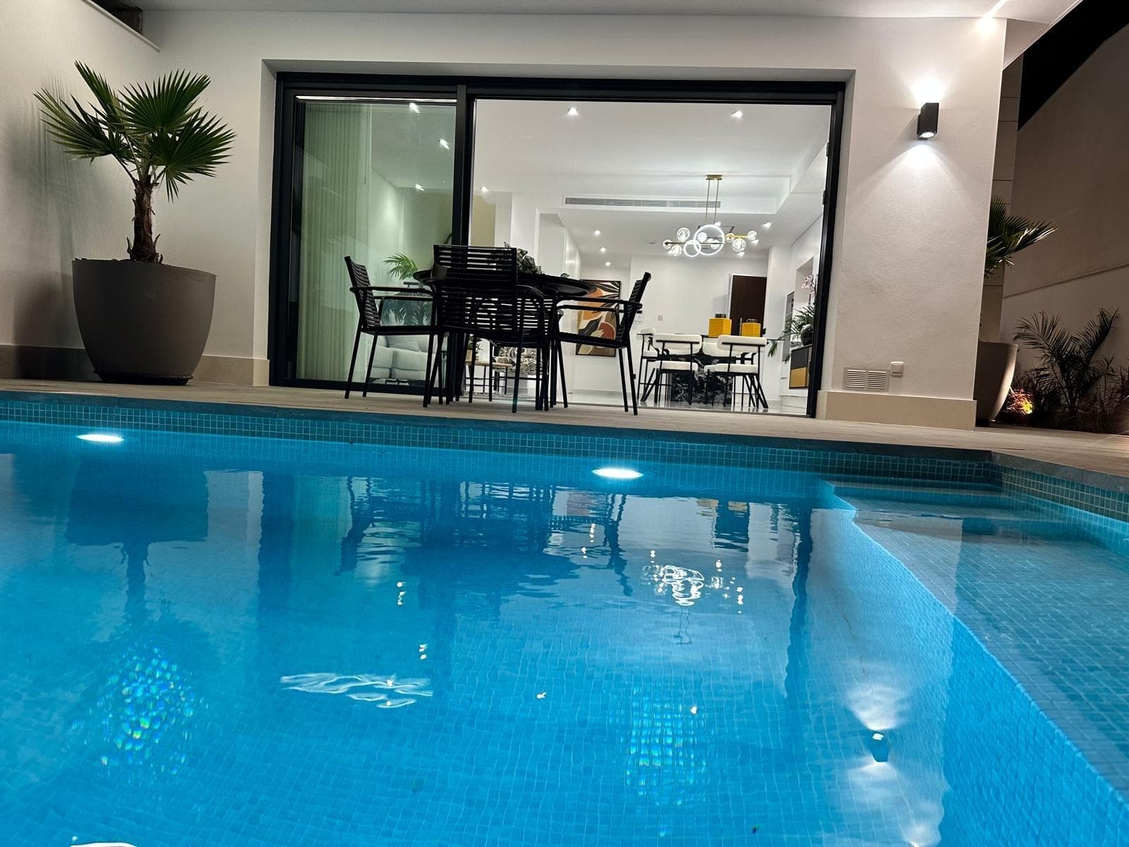 Modern New Build Villas for Sale in San Pedro del Pinatar – Close to Beach and Town Centre

Exclusive Residential Project in Costa Cálida
This new boutique development consists of just four contemporary independent villas, ideally located in a quiet residential area near the centre of San Pedro del Pinatar, Murcia. Just 1.4 km from the beaches of Lo Pagán, these homes offer the perfect combination of comfort, privacy, and proximity to essential services and coastal attractions.

San Pedro del Pinatar is one of the most sought-after destinations on the Costa Cálida, known for its natural salt lagoons, therapeutic mud baths, and a wide variety of leisure, dining, and wellness options. With both the Mediterranean Sea and Mar Menor within easy reach, this location is ideal for enjoying year-round sunshine and a relaxed lifestyle.

Contemporary Design and Smart Layout
Each villa features:

3 bedrooms and 3 bathrooms, including two en-suite bathrooms
Open-plan kitchen and living area, with direct access to a spacious terrace
Ground floor bedroom and bathroom, ideal for guests or multi-generational living
Private swimming pool with LED lighting and outdoor solar shower
Large rooftop solarium for sunbathing, entertaining or relaxing
Plot with private parking space

The homes have been designed with modern living in mind, offering high-quality finishes and smart installations:

Security entrance door
Motorised aluminium shutters
Pre-installation of ducted air conditioning
Underfloor heating in bathrooms
Fitted bathrooms with illuminated mirrors and furniture
A show villa is available for viewing, allowing you to experience the high standards and layout in person.

Prime Location with Excellent Connectivity
These villas are perfectly located to enjoy both tranquillity and convenience. All daily services including shops, restaurants, supermarkets, and health centres are within walking distance. In addition, the area is well connected by road and public transport.

Distances to main points of interest:

Lo Pagán Beach: 1.4 km
Mar Menor beaches: 2 km
Dos Mares Shopping Centre: 3.5 km
Lo Romero Golf Course: 10 km
Roda Golf Resort: 9 km
Murcia International Airport: 35 km (25 minutes by car)
Alicante Airport: 75 km (45 minutes by car)

Reserve Your New Villa in San Pedro Today
This is a rare opportunity to own a newly built villa in one of the most desirable coastal areas of Murcia. With limited units available, contact us now to receive more information, schedule a visit, or secure your dream home by the sea.
