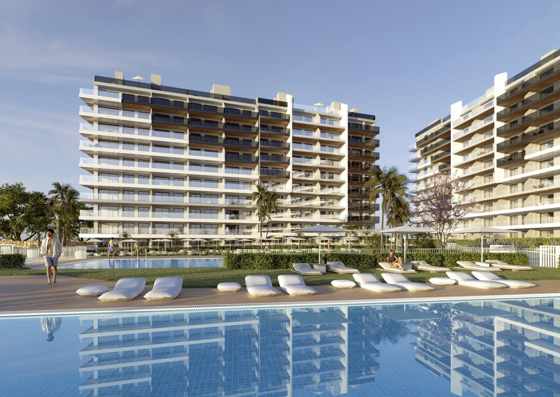 New Build Apartments in Punta Prima Just 250 Metres from the Sea

Exclusive residential complex with premium communal areas on the Costa Blanca
We present a modern new-build residential complex comprising 250 apartments in Punta Prima, one of the most sought-after areas of Torrevieja. Located just 250 metres from the sea, this project offers a unique opportunity to live close to the beach with all the amenities of a private resort.

2 and 3-bedroom homes with large terraces
The apartments are available in 2 or 3 bedroom configurations with 2 bathrooms, all with an open-plan kitchen integrated into the living room, maximising the feeling of space and natural light. The ground floor properties have private gardens, the middle floors offer large terraces, and the penthouses have solariums to enjoy the sun all year round.

Each unit includes a parking space and storage room, ensuring convenience and additional storage space.

Communal areas for the whole family
The residential complex has been designed to offer an exceptional quality of life. Its communal areas include three swimming pools (one of which is heated), a gym with a jacuzzi, a paddle tennis court, a petanque court and landscaped gardens. The little ones have their own children's pool and a play area designed for their safe entertainment.

High-quality finishes and energy efficiency
PVC exterior carpentry with thermal break
Double glazing and motorised blinds in bedrooms
Fitted kitchen with appliances included
Bathrooms equipped with shower screen, cabinet, mirror and underfloor heating
Air conditioning system using aerothermal heat pump
Security entrance door
Bicycle parking

Strategic location with nearby amenities
Punta Prima is located just 5 km from the centre of Torrevieja and has excellent health, educational and transport infrastructure. Alicante International Airport is only 45 km away.
Punta Prima beach: 250 m
Villamartín Golf Course: 7 km
La Zenia Boulevard Shopping Centre: 4 km
Torrevieja University Hospital: 3 km
Torrevieja Marina: 6 km

An ideal investment for a home or holiday
Enjoy a Mediterranean setting with year-round amenities, quality beaches and excellent transport links. Don't miss the opportunity to purchase your new home in one of the most sought-after locations on the Costa Blanca. Contact us today for more information or to arrange a viewing.