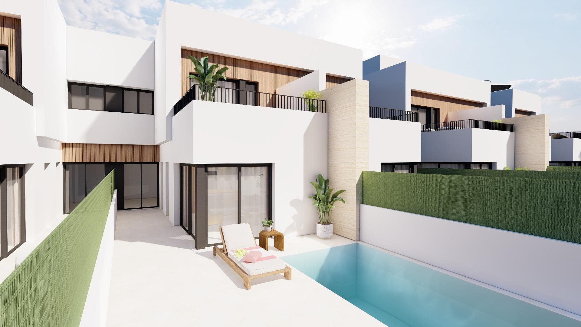 Modern semi-detached villas with private pool near the sea in Santiago de la Ribera

Located in the San Blas area of Santiago de la Ribera, Murcia, one of the most attractive areas of the Mar Menor.
This development is designed with 12 villas with 3 bedrooms and 2/3 bathrooms, including a private pool, terrace and solarium with summer kitchen in selected homes.


The villas feature elegant and functional interiors, fully equipped kitchens with all appliances, and pre-installation for ducted air conditioning.
This development offers a unique opportunity to enjoy design, comfort and style just a few minutes from the sea.

Exclusive new-build development just 1 km from the beach
Discover this limited edition development of semi-detached villas located in Santiago de la Ribera, a charming coastal town on the Murcian coast, known for its relaxed lifestyle, clean beaches and excellent year-round climate. These new homes are located just 1 km from the coast of the Mar Menor, offering the perfect combination of privacy, comfort and proximity to essential services and leisure options.

Contemporary design with functional layout
Each villa is carefully laid out over two floors and some units enjoy a rooftop solarium, providing ample space for modern living. The properties feature:

3 spacious bedrooms, including one on the ground floor
2 or 3 full bathrooms.
Private garden and swimming pool.
Terrace on the first floor and some units with a rooftop solarium, ideal for sunbathing or entertaining guests.
Private parking within the plot.
In addition, two of the homes have photovoltaic panels installed for energy savings.

High-quality finishes and features
Built with attention to detail and to modern standards, the homes include:
Secured entrance door
Motorised aluminium shutters
Fitted kitchen with appliances
Bathroom furniture with mirror and light
Porcelain shower tray made to measure for the bathroom with screens installed
Pre-installation of ducted air conditioning

These homes are designed to be enjoyed all year round, whether as a main residence, second home or investment for holiday rentals.

Privileged location on the Costa Cálida
Santiago de la Ribera offers a dynamic Mediterranean lifestyle with everything close at hand:

Beach (Mar Menor) – 1 km
La Ribera shopping centre – 2 km
Roda Golf – 5 km
San Javier Airport – 6 km
Lo Pagán marina – 4 km
Dos Mares shopping centre – 3 km
Excellent road access to Murcia (40 km) and Cartagena (30 km)

With its rich local culture, weekly markets, promenades and water sports options, Santiago de la Ribera is an ideal place to enjoy the best of the Costa Cálida.

Make your dream of living on the coast a reality
Don't miss this unique opportunity to purchase an elegant, newly built villa in one of the most sought-after areas of the Murcian coast.
Contact us now for more information or to arrange a viewing.