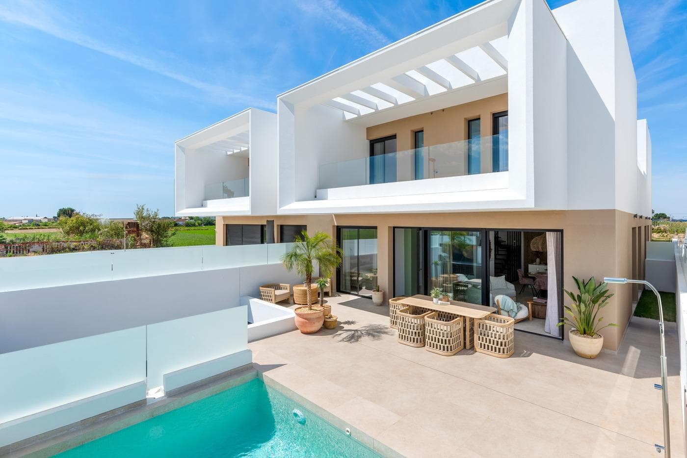 New Build Semi-Detached and Terraced Villas in Dolores, Alicante&#13;&#13;Discover this exclusive new development of 20 modern semi-detached and terraced villas in Dolores, a charming town located in the heart of the Vega Baja region, in the province of Alicante. Surrounded by orchards and natural beauty, Dolores offers a peaceful lifestyle just a short drive from the Mediterranean coast.&#13;&#13;Contemporary Villas with Private Pools&#13;Each home in this new development is thoughtfully designed over two floors and features:&#13;3 spacious bedrooms&#13;2 full bathrooms and 1 guest toilet&#13;Open-plan kitchen with island, furnished and equipped with appliances&#13;Bright living-dining area with direct access to the terrace&#13;Private garden with swimming pool, filtration system, and LED lighting&#13;On-site parking within the plot&#13;&#13;These villas combine functionality and style, offering everything needed for modern Mediterranean living.&#13;&#13;High-Efficiency Features and Modern Comforts&#13;Built to the highest standards, the homes include:&#13;Ducted air conditioning installation on both floors&#13;250-liter aerothermal water heating system&#13;Electric underfloor heating in bathrooms&#13;Motorized blinds&#13;LED lighting throughout the interior and exterior&#13;3kW photovoltaic solar panels for improved energy efficiency&#13;&#13;These features ensure a sustainable and comfortable home environment year-round.&#13;&#13;Ideal Location Near the Coast and Amenities&#13;Dolores is a well-connected and growing town just 12 km from the stunning beaches of La Marina and Guardamar del Segura. The area offers essential services including shops, restaurants, schools, and health centers. It also maintains a tranquil, residential atmosphere ideal for families and retirees.&#13;&#13;Distances to main points of interest:&#13;La Marina Beach – 12 km&#13;Guardamar del Segura – 14 km&#13;Alicante Airport – 30 km&#13;Murcia-Corvera Airport – 85 km&#13;La Marquesa Golf (Ciudad Quesada) – 13 km&#13;Torrevieja – 25 km&#13;&#13;Your New Home Awaits in Dolores&#13;Whether you're looking for a permanent residence, a holiday retreat, or an investment in the Costa Blanca, these new villas in Dolores are a perfect choice. Contact us today for more information or to schedule a viewing.&#13;&#13;