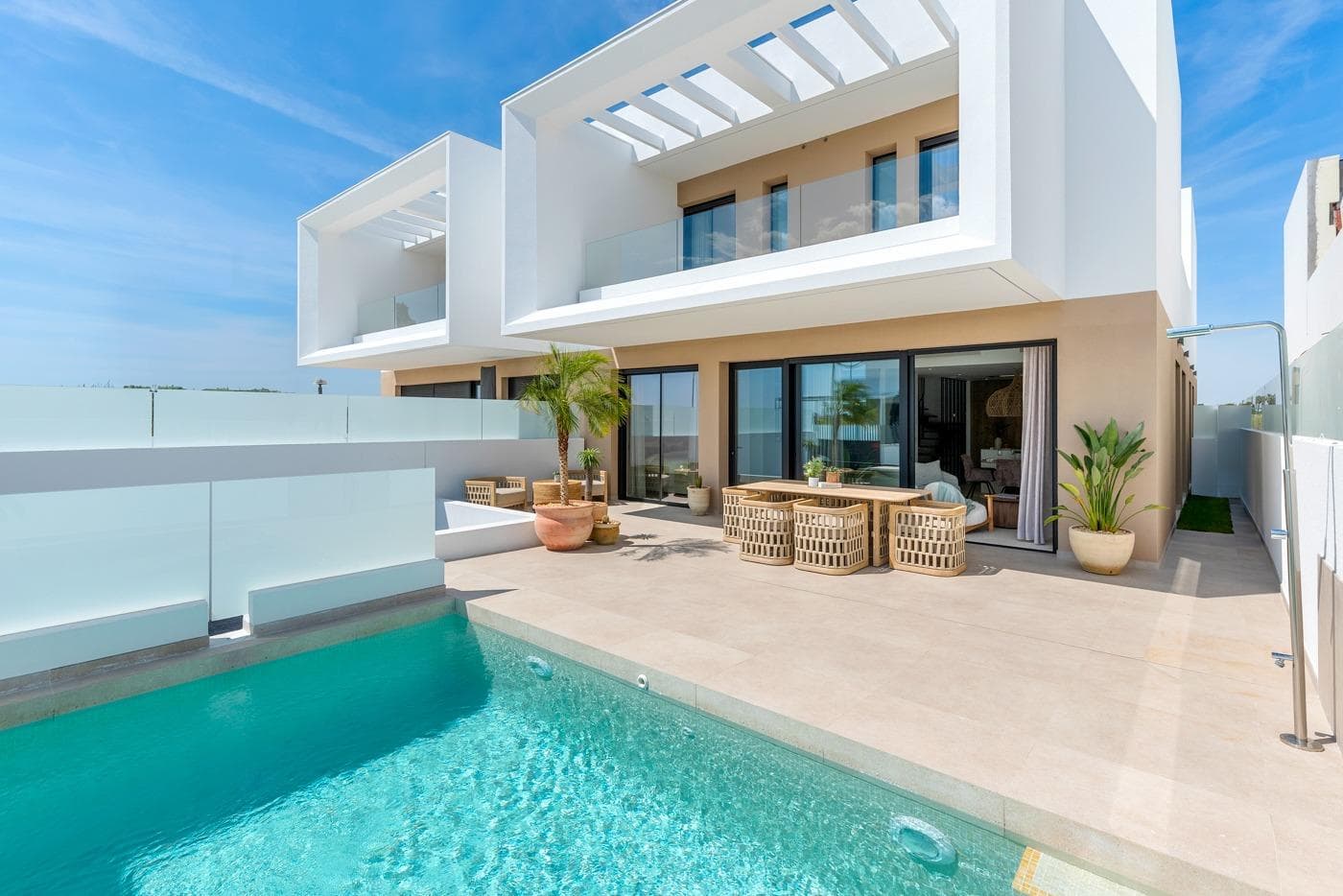 New Build Semi-Detached and Terraced Villas in Dolores, Alicante&#13;&#13;Discover this exclusive new development of 20 modern semi-detached and terraced villas in Dolores, a charming town located in the heart of the Vega Baja region, in the province of Alicante. Surrounded by orchards and natural beauty, Dolores offers a peaceful lifestyle just a short drive from the Mediterranean coast.&#13;&#13;Contemporary Villas with Private Pools&#13;Each home in this new development is thoughtfully designed over two floors and features:&#13;3 spacious bedrooms&#13;2 full bathrooms and 1 guest toilet&#13;Open-plan kitchen with island, furnished and equipped with appliances&#13;Bright living-dining area with direct access to the terrace&#13;Private garden with swimming pool, filtration system, and LED lighting&#13;On-site parking within the plot&#13;&#13;These villas combine functionality and style, offering everything needed for modern Mediterranean living.&#13;&#13;High-Efficiency Features and Modern Comforts&#13;Built to the highest standards, the homes include:&#13;Ducted air conditioning installation on both floors&#13;250-liter aerothermal water heating system&#13;Electric underfloor heating in bathrooms&#13;Motorized blinds&#13;LED lighting throughout the interior and exterior&#13;3kW photovoltaic solar panels for improved energy efficiency&#13;&#13;These features ensure a sustainable and comfortable home environment year-round.&#13;&#13;Ideal Location Near the Coast and Amenities&#13;Dolores is a well-connected and growing town just 12 km from the stunning beaches of La Marina and Guardamar del Segura. The area offers essential services including shops, restaurants, schools, and health centers. It also maintains a tranquil, residential atmosphere ideal for families and retirees.&#13;&#13;Distances to main points of interest:&#13;La Marina Beach – 12 km&#13;Guardamar del Segura – 14 km&#13;Alicante Airport – 30 km&#13;Murcia-Corvera Airport – 85 km&#13;La Marquesa Golf (Ciudad Quesada) – 13 km&#13;Torrevieja – 25 km&#13;&#13;Your New Home Awaits in Dolores&#13;Whether you're looking for a permanent residence, a holiday retreat, or an investment in the Costa Blanca, these new villas in Dolores are a perfect choice. Contact us today for more information or to schedule a viewing.&#13;&#13;