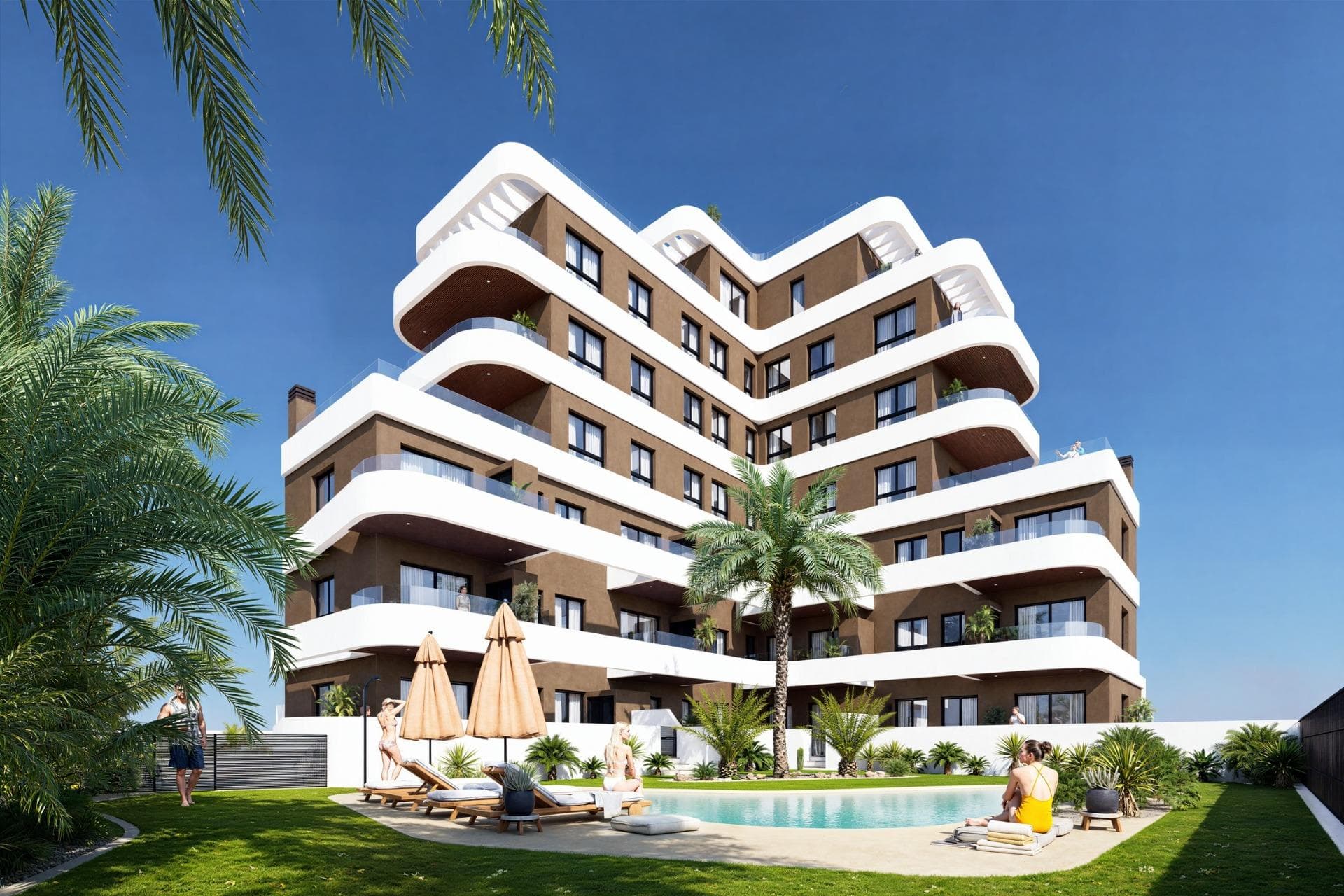 New Build Apartments in Guardamar del Segura – Modern Living Just 1.4 km from the Beach&#13;&#13;Discover a new residential development in Guardamar del Segura, Alicante, offering just 19 exclusive, modern homes designed for comfortable, contemporary living on the Costa Blanca. Ideally located just 1.4 km from the beach and a short walk from the town center, this development combines style, practicality, and a prime coastal setting.&#13;&#13;Exclusive Residential Project with Limited Availability&#13;This boutique development features 2 and 3-bedroom apartments with a range of layouts to suit different needs:&#13;Ground-floor units with spacious private terraces&#13;Mid-level apartments with generous balconies or open terraces.&#13;A spectacular penthouse with a private solarium and swimming pool&#13;&#13;Each property showcases elegant, curved architectural lines, glass railings, and modern finishes—ideal for both year-round residence or a luxurious holiday retreat.&#13;&#13;Premium Finishes and Energy-Efficient Features&#13;Designed for comfort and sustainability, each home includes:&#13;Reinforced front door for added security&#13;Fully furnished kitchen with appliances included&#13;Energy-efficient aerothermal system for hot water&#13;Private parking space included in the price&#13;&#13;The building also features a communal swimming pool and landscaped garden areas, perfect for enjoying the sunny Mediterranean climate.&#13;&#13;Prime Location in Guardamar del Segura&#13;Situated in a well-connected and vibrant part of Guardamar, this development provides easy access to nature, beaches, and essential services. Residents enjoy proximity to supermarkets, restaurants, medical centers, parks, and the town’s famous pine forest and dunes.&#13;&#13;Key distances:&#13;Guardamar town center – 1 km&#13;Closest beach – 1.4 km&#13;Marina – 2 km&#13;Reina Sofía Park – 1.5 km&#13;La Marquesa Golf (Ciudad Quesada) – 9 km&#13;Habaneras Shopping Center (Torrevieja) – 13 km&#13;Alicante-Elche Airport – 33 km&#13;&#13;Public transport connections include direct bus lines to Alicante and Torrevieja, offering easy access without the need for a car.&#13;&#13;Secure Your Apartment on the Costa Blanca&#13;Whether you’re looking for a permanent residence, vacation property, or smart investment, this new development in Guardamar del Segura is the perfect choice. Contact us today to learn more or reserve your new home by the sea.&#13;