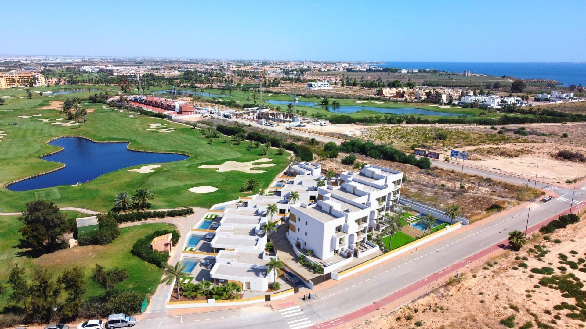 New Build Residential Complex in Los Alcázares on the Frontline of Serena Golf&#13;&#13;Exclusive Living on the Costa Cálida&#13;Discover this new residential development in Los Alcázares, perfectly located on the frontline of Serena Golf and just 1.3 km from the beaches of the Mar Menor. Nestled in the heart of the Costa Cálida, this project combines modern architecture, comfort, and exceptional surroundings. With excellent road connections, the complex is only 30 km from Murcia Airport (25 minutes) and 90 km from Alicante Airport (55 minutes), offering easy access to Cartagena, Murcia, and the Costa Blanca.&#13;&#13;Contemporary Homes with Exceptional Design&#13;The residential complex includes 18 elegant apartments and 7 exclusive villas, each designed to maximize space, light, and functionality. Residents will enjoy breathtaking views of the golf course and, from the upper floors, the sparkling waters of the Mar Menor.&#13;&#13;Choose from:&#13;Apartments with 2 or 3 bedrooms and 2 bathrooms, all with dual orientation and two terraces for all-day sunlight.&#13;Ground-floor apartments with private gardens.&#13;Middle-floor units with large terraces.&#13;Penthouses with two terraces, private solarium, and panoramic views.&#13;Detached villas on the frontline of golf, with 3 bedrooms, 2 bathrooms, basement, solarium, and private pool.&#13;&#13;Premium Features and Amenities&#13;Every home is equipped with high-quality finishes and modern comforts, including:&#13;Parking space and storage room&#13;Aerothermal hot water system&#13;Pre-installed ducted air conditioning&#13;Electric shutters and full lighting package&#13;Fully fitted bathrooms with furniture and shower screens&#13;Communal swimming pool and landscaped gardens&#13;Elevator in the apartment blocks&#13;&#13;Perfect Location for Golf and Beach Lovers&#13;Situated in a privileged enclave, the development is surrounded by the peaceful greenery of Serena Golf and lies just a short walk from the warm, shallow waters of the Mar Menor. This unique area offers year-round opportunities for swimming, sailing, paddleboarding, and other water sports, making it ideal for both relaxation and activity.&#13;&#13;Key distances:&#13;Beach (Mar Menor): 1.3 km&#13;Serena Golf: Adjacent to the complex&#13;Los Alcázares town center: 2 km&#13;Cartagena: 22 km&#13;Murcia city: 40 km&#13;Murcia Airport: 30 km (25 minutes)&#13;Alicante Airport: 90 km (55 minutes)&#13;&#13;Secure Your Mediterranean Lifestyle&#13;This development in Los Alcázares offers the perfect combination of beach, golf, and modern living. Whether as a permanent residence, holiday retreat, or investment, it provides everything needed for an authentic Mediterranean lifestyle.&#13;Contact us today to arrange a visit and secure your new home on the Costa Cálida.&#13;