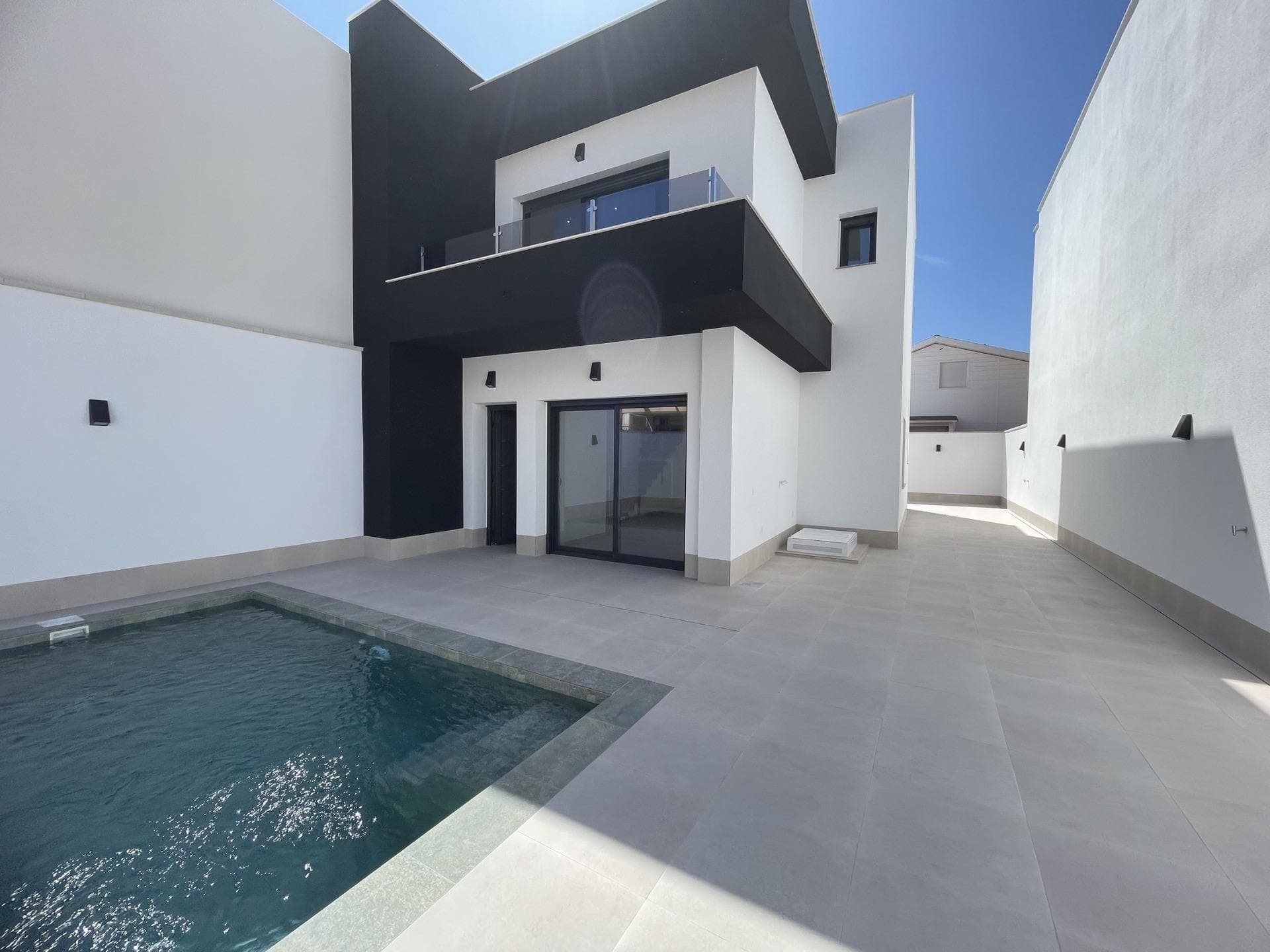 New Build Villas for Sale in Las Heredades, Costa Blanca&#13;&#13;Modern Villas in a Peaceful and Well-Connected Area&#13;Discover this exclusive development of 5 contemporary villas located in Las Heredades, a charming and quiet village near Rojales and Almoradí, in the heart of the Costa Blanca South. This peaceful residential area offers an authentic Spanish lifestyle surrounded by nature while remaining close to all amenities, golf courses, and the Mediterranean beaches of Guardamar del Segura and Torrevieja, just 12 km away.&#13;&#13;Elegant and Functional Design&#13;These newly built villas feature a modern Mediterranean design that combines comfort, style, and practicality. Each property is distributed over two floors, offering bright and spacious interiors that blend seamlessly with outdoor living spaces.&#13;&#13;The villas include 3 bedrooms and 3 bathrooms, an open-plan kitchen with fully integrated appliances, and a spacious living-dining area with direct access to the terrace and garden. Built with high-quality materials and attention to detail, these homes ensure a comfortable and energy-efficient lifestyle all year round.&#13;&#13;Private Outdoor Spaces and Premium Features&#13;Each villa is built on its own private plot with:&#13;Private swimming pool (6x3 m)&#13;Landscaped garden with automatic irrigation system&#13;Private parking space for two vehicles&#13;Terraces and outdoor seating areas perfect for enjoying the Mediterranean climate&#13;&#13;Additional features include:&#13;Air conditioning through ducts&#13;LED lighting throughout the interior and exterior&#13;Built-in wardrobes in all bedrooms&#13;Fully furnished kitchen with modern appliances&#13;&#13;A Perfect Location for Relaxed Mediterranean Living&#13;Las Heredades is ideal for those seeking tranquility without giving up proximity to beaches, golf, and leisure areas. With its traditional Spanish atmosphere and excellent road connections, this area is perfect for both permanent living and holidays on the Costa Blanca.&#13;&#13;Distances to key points of interest:&#13;Beaches of Guardamar del Segura: 12 km&#13;Rojales town center: 3 km&#13;Almoradí: 2 km&#13;La Marquesa Golf: 5 km&#13;Torrevieja: 15 km&#13;Alicante International Airport: 40 km (about 45 minutes by car)&#13;Murcia Airport (Corvera): 50 km&#13;&#13;Contact us today to arrange a visit and discover your dream home in Las Heredades, Costa Blanca.&#13;