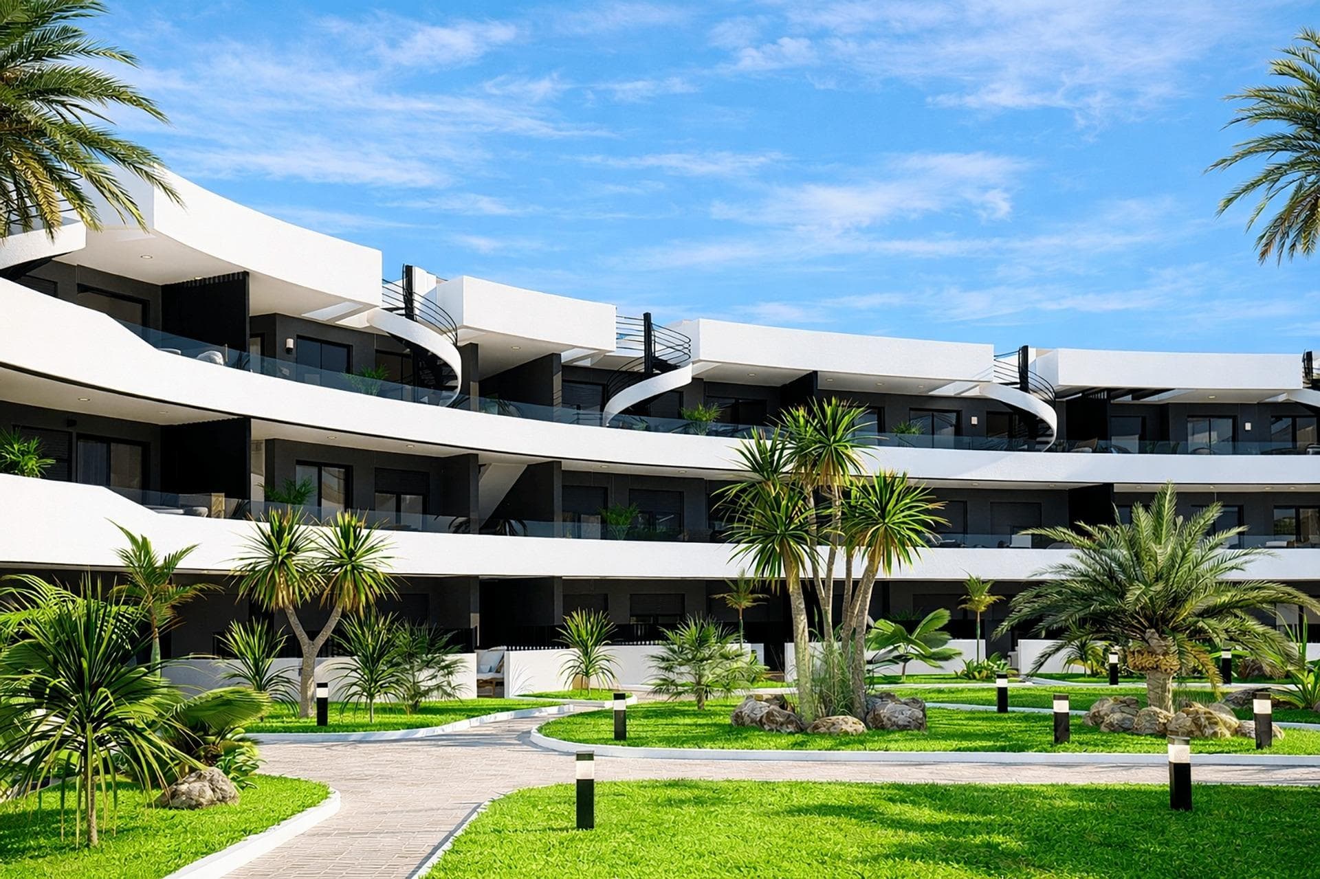 Luxury Golf Front Apartments Near the Sea in Los Alcazares Costa CalidaExclusive New Build Apartments in La Serena GolfDiscover this exceptional new residential development located frontline to La Serena Golf in Los Alcazares, just 700 meters from the Mar Menor beaches. This modern complex offers 28 luxury apartments designed to provide maximum comfort, natural light and a high quality Mediterranean lifestyle.The building features a distinctive J shaped design with a curved facade, carefully oriented to enhance sunlight exposure and open views over the golf course and surrounding landscape. Its prime location combines the tranquility of a golf environment with close proximity to the sea and town center.Modern Apartments with Spacious Terraces and SolariumsThe development offers stylish two and three bedroom apartments, all with two bathrooms including an en suite. Each property has been designed to maximize outdoor living, a key element of life on the Costa Calida.Ground and first floor apartments feature large private terraces, perfect for outdoor dining and relaxation. Top floor properties benefit from generous private solariums, complete with a summer kitchen, offering an ideal space to enjoy the sun all year round.Elegant Interiors and High Quality FinishesInside, the apartments combine modern design with functional layouts. Open plan living areas connect seamlessly with outdoor spaces, creating bright and comfortable environments.The kitchens come fully equipped with appliances, while bathrooms are delivered complete with vanity units, mirrors and shower screens. Additional features include a reinforced security entrance door, aerothermal system for hot water, LED lighting package and pre installation for ducted air conditioning.Communal Areas Designed for RelaxationResidents can enjoy a large communal swimming pool surrounded by beautifully landscaped gardens, providing a peaceful setting to relax and socialize under the Mediterranean sun.Each apartment also includes a private parking space and storage room in the underground garage, ensuring convenience and security.Prime Location Close to Golf, Beach and ServicesThis development is ideally located just 700 meters from the beach and approximately 1.5 km from the center of Los Alcazares, where you will find a wide range of restaurants, shops, cafes and essential services.Los Alcazares is a popular coastal town known for its relaxed atmosphere, long promenades and warm shallow waters. Key distances include Murcia International Airport 35 km, Alicante Airport 95 km, La Serena Golf at your doorstep, Roda Golf 4 km and Cartagena city 25 km.Ideal Investment or Holiday Home on the Costa CalidaThese golf front apartments offer an excellent opportunity to own a modern property in a privileged location close to both the sea and golf.Contact us today to receive more information or to arrange a viewing and secure your new home in Los Alcazares.