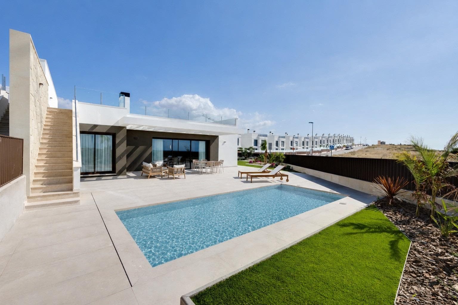 New Build Semi Detached Villas for Sale in Mutxamel with Private Pool and Sea ViewsExclusive New Build Villas in Mutxamel Near Bonalba Golf and the CoastDiscover this unique collection of 34 elegant semi detached villas in Mutxamel, located in the sought after residential area of Cotoveta on the Costa Blanca North. Designed for buyers seeking privacy, comfort, and a high quality Mediterranean lifestyle, these modern homes combine contemporary architecture, generous outdoor spaces, and beautiful sea views from many of the solariums.Set in a peaceful natural environment just 4 km from the beach and close to Bonalba Golf Resort, this exclusive development offers the perfect balance between tranquility, convenience, and excellent connections to Alicante city and the airport.Modern Single Level Villas Designed for ComfortThese stylish new build villas are thoughtfully distributed over one floor, offering 124 m2 of bright and functional living space. Each property features 3 spacious bedrooms and 3 bathrooms, with 2 of them ensuite, creating privacy and comfort for both owners and guests.The open plan kitchen connects seamlessly with the living and dining area, creating a spacious and welcoming environment filled with natural light. Large windows enhance the connection between indoor and outdoor living, allowing you to fully embrace the Mediterranean climate.Each villa includes fitted wardrobes, a private terrace, a rooftop solarium, a private swimming pool, landscaped garden, and private parking within the plot.Premium Location in Mutxamel and CotovetaMutxamel is a charming town located just north of Alicante, offering a peaceful residential atmosphere while remaining close to the vibrant coastline. The Cotoveta area is known for its natural surroundings, open views, and proximity to Bonalba Golf, one of the most popular golf courses in the region.Residents benefit from easy access to schools, healthcare centers, shopping areas, restaurants, and leisure activities, making this an ideal location for permanent living, holiday use, or investment.Excellent Connections and Nearby Points of InterestBonalba Golf Resort 2 kmEl Campello Beach 4 kmPort of Alicante 18 kmAlicante city centre 15 kmSan Juan Beach 8 kmAlicante Golf 10 kmAlicante International Airport 28 kmVillajoyosa 25 kmBenidorm 35 kmA Smart Investment on the Costa BlancaSurrounded by nature and close to the sea, these villas offer an exceptional opportunity to enjoy the best of the Costa Blanca lifestyle. Whether as a primary residence, holiday home, or rental investment, this development combines location, design, and quality in one of the most attractive areas of Alicante.Contact us today for more information or to arrange your private visit and secure your dream villa in Mutxamel.