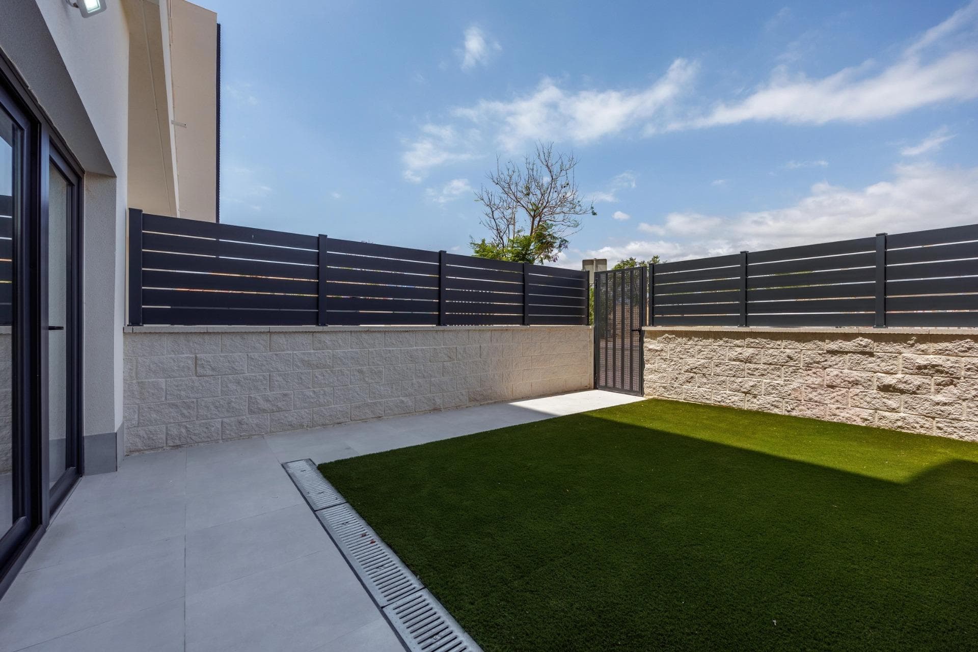 Unique Investment Opportunity in Villajoyosa Costa Blanca NorthDiscover an exclusive collection of 8 licensed tourist apartments in Villajoyosa, perfectly designed for investors seeking a secure and high demand holiday rental asset on the Costa Blanca North. These ground floor properties are part of two recently completed modern buildings and are fully adapted and licensed for tourist residential use, offering a rare legal advantage in a market where new tourist licenses are becoming increasingly restricted.Located just 900 metres from the sea, these properties combine an unbeatable coastal setting with strong rental potential and long term value.Tourist Licensed Apartments with Private GardensThis boutique collection consists of spacious 2 and 3 bedroom apartments, each with 2 bathrooms, including one ensuite. All homes feature independent street access and private terrace gardens of up to 37 m2, creating a unique blend of privacy, comfort and outdoor living.Unlike many tourist properties, these apartments are located outside the residential community structure. This means no community fees, no exposure to potential community voting restrictions on tourist licenses, and full independence with direct street access. This makes them an especially attractive and secure investment option.The apartments are delivered with fully equipped kitchens and ducted air conditioning already installed, making them almost ready to start operating immediately after completion.Prime Location in VillajoyosaVillajoyosa is one of the hidden gems of the Costa Blanca, located between the vibrant city of Benidorm and the charming coastal town of Altea. Famous for its colorful old town, artisan chocolate heritage and beautiful Blue Flag beaches, Villajoyosa attracts a loyal international visitor base from Belgium, the Netherlands, France, Germany and Poland.The town offers a relaxed Mediterranean lifestyle with a strong tourism profile throughout the year, from beach holidays in summer to gastronomy and long stay rentals in the quieter seasons.Within walking distance, residents and guests can enjoy the old town restaurants, weekly local market and the TRAM station connecting the entire Costa Blanca coastline.Distances to Key Points of InterestBeach 0.9 kmShopping centre 0.95 kmVillajoyosa old town 1.5 kmVillajoyosa Marina 2 kmBenidorm 12 kmAltea 20 kmMelia Villaitana Golf 14 kmAlicante Airport 45 kmA Smart Costa Blanca InvestmentWith legal tourist licenses already in place, limited supply and excellent rental demand, these apartments represent a unique investment opportunity on the Costa Blanca North. Contact us today for more information or to arrange your private visit to the show home.