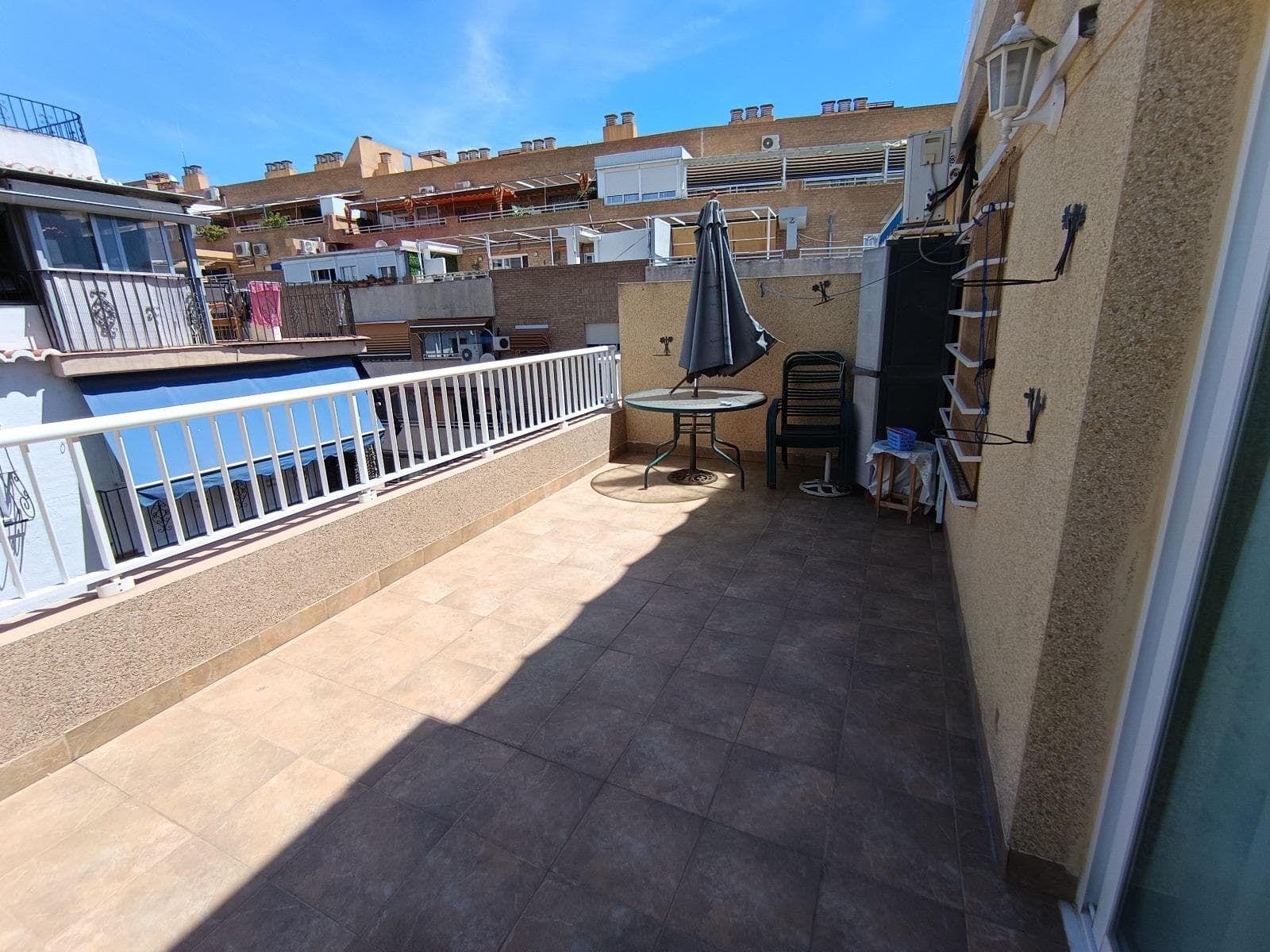 Live in the heart of Benidorm with a private sunny terrace! Discover this charming penthouse located in the center of Benidorm, one of the most sought-after areas. The home stands out for its spacious 30-square-meter terrace, fully sunny and perfect for enjoying the Mediterranean climate year-round. A unique space to relax, sunbathe, read, dine al fresco, or entertain guests. The home is practically laid out, with plenty of natural light and cross-ventilation. Ideal as a permanent residence, second home, or investment, as it has great potential for vacation rentals thanks to its strategic location. You are just steps from Gambo Street, the center's main shopping area, full of shops, cafes, and services. Just a few minutes' walk away, you'll find Levante Beach and Poniente Beach, two of the most famous beaches on the Costa Blanca, with their crystal-clear waters and lively promenade, supermarkets (Ma y Mas, Consum, and Mercadona), pharmacies, bars, and restaurants. Nearby is L'Aigüera Park, the city center's green lung and a regular venue for open-air events and concerts. The municipal market, supermarkets, banks, pharmacies, medical centers, and bus and taxi stops are also within easy reach. The building has an elevator and is well-maintained. The area is quiet, safe, and vibrant year-round. Plus, being on a central street, you'll have everything at your fingertips without needing a car. If you're looking for a charming penthouse with a large sunny terrace and the convenience of living in the heart of Benidorm, this is your opportunity. Call us and come and visit us without obligation! Live the Mediterranean lifestyle you've always dreamed of.