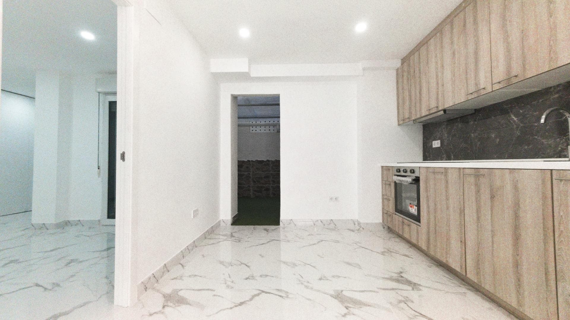 We proudly present this magnificent fully renovated apartment, located in one of the most sought-after areas of the Costa Blanca, right by Playa de los Náufragos in Torrevieja. The property, completely refurbished with meticulous finishes, is brand new and offers a modern, functional design. With a built area of 110 m² and northeast orientation, it features 3 spacious bedrooms with fitted wardrobes, 3 full bathrooms (2 en suite), an open-plan kitchen, and a bright living-dining room with direct access to private-use patios connected to each bedroom. The property is located just 7 steps from the sea, making it a true privilege to live right by the beach. Additionally, the apartment includes a private indoor parking space within the community with direct access to the property. Community fees are extremely low (only €100/year), making it a very attractive option also in terms of maintenance. A unique opportunity to enjoy the Mediterranean lifestyle at its finest: a renovated, elegant, and move-in-ready home, where comfort, seaside living, and style come together perfectly, with the sea practically at your doorstep.