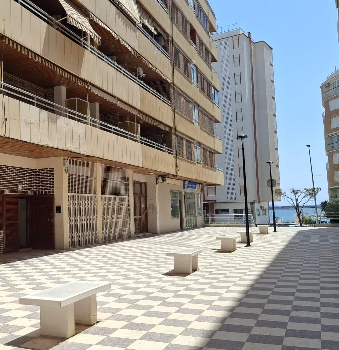 Fully renovated apartment of approximately 90 m², located in a prime area just a 5-minute walk from El Acequión beach, with pleasant sea views from its spacious terrace. The property offers a functional and bright layout. Upon entering, there is an elegant hallway leading to a spacious living-dining area with built-in lighting, designed to maximize comfort and natural light. It features two bedrooms and two bathrooms, with the master bedroom standing out due to its generous size (approx. 22 m²) and en-suite bathroom. The living area includes a modern open-plan kitchen, equipped with a Silestone worktop and integrated appliances from the well-known Bosch brand, combining design and functionality. The property has been fully renovated, including an upgraded electrical installation with increased capacity up to 6.9 kW, as well as a complete renovation of plumbing and drainage systems. In addition, all windows and doors have been replaced with high-quality carpentry featuring double glazing and thermal/acoustic insulation. For added comfort, the apartment is equipped with ducted air conditioning and a 100 L electric water heater with WiFi control. A move-in ready property, ideal both as a permanent residence or as an investment, thanks to its excellent location and high-quality renovation. To see this property with your own eyes and feel the Mediterranean sea breeze, contact us today with no obligation.