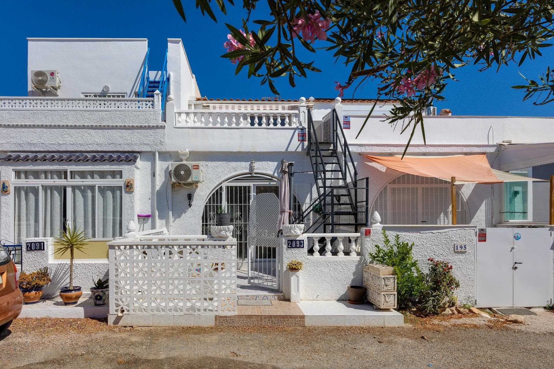 Discover this charming two-storey bungalow in the peaceful area of San Luis, Torrevieja. Just a ten-minute drive from the stunning beaches and with all services within reach, this property is a perfect oasis to enjoy the Mediterranean sun. It is distributed over two floors: On the ground floor, you are welcomed by a beautiful porch leading into a bright living-dining room connected to a fully equipped open kitchen; it also features a cozy double bedroom and a full bathroom—ideal for guests. The first floor has independent exterior access: perfect as an additional residence or guest studio. Enjoy the outdoors on its spacious sunny terrace or make use of the extra space by renting it out! This bungalow is not only your dream home but also an excellent real estate investment. Don’t wait any longer! Contact us today if you’re interested.