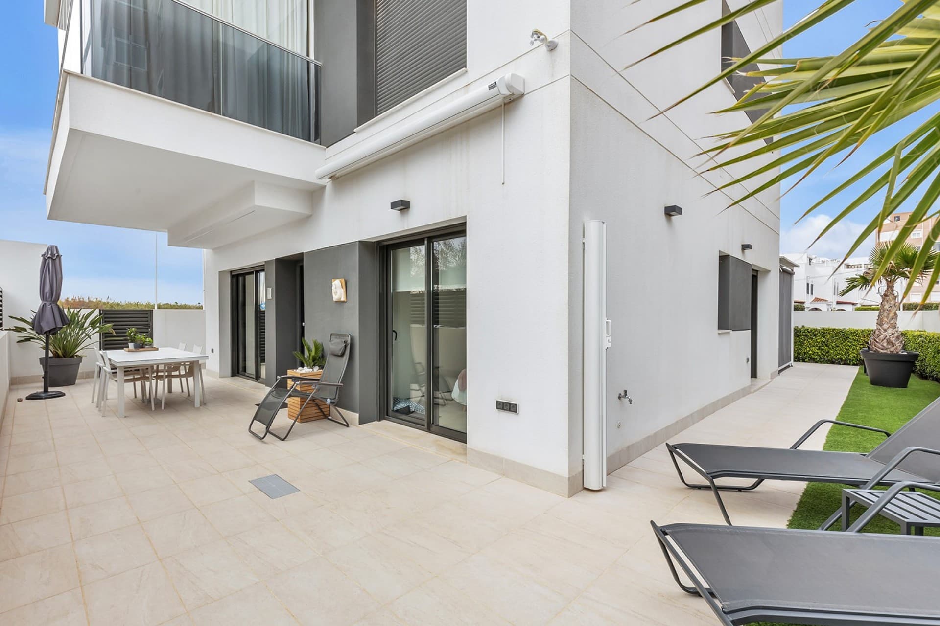 This new buildground floor apartment in La Mata is sold completely ready to move in (keyready) and is located in a small-scale and well-maintained residence withinwalking distance of the beach. The property combines modern comfort,high-quality finishes and a pleasant Mediterranean lifestyle.The flat has twospacious and bright bedrooms and two modern bathrooms with walk-in showers,ensuring optimal comfort and privacy. The stylish living space with open, fullyequipped kitchen connects seamlessly to the outdoor area and creates a spaciousand light living experience.The spaciousprivate garden is a natural extension of the living space and offers enoughroom for a lounge and dining area, ideal for enjoying the outdoor life on theCosta Blanca all year round.The property issold fully ready to move into, including furniture and fittings. In addition,the flat has a private parking space in front of the building and a privatestorage room in the basement, both included in the price. Residents can alsouse the communal swimming pool within the residence.Thanks to itsexcellent location in La Mata, close to the beach and all amenities, this flatis ideal as a second home, investment or permanent residence on the CostaBlanca.