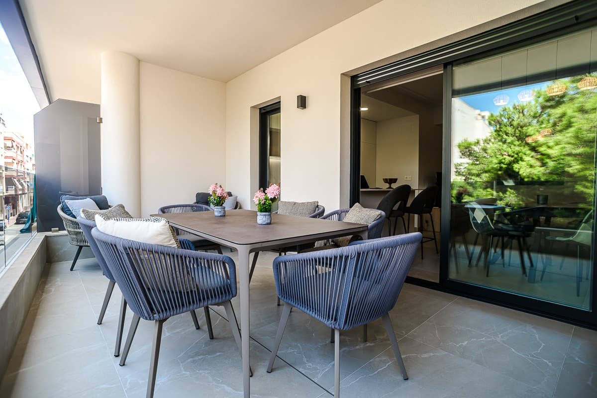 Elegant 2-Bedroom Apartment with Garage & 17 m² Terrace – Just 100m from Playa del Cura, Torrevieja

Experience the very best of Mediterranean living in this exceptional 2-bedroom, 2-bathroom apartment, perfectly located just 10 0 meters from the golden sands of Playa del Cura . Situated on the 2nd floor , this stylish home offers both comfort and privacy while keeping you within easy reach of Torrevieja's vibrant coastal lifestyle.

Step inside to discover a beautifully presented, fully furnished interior where every detail has been thoughtfully designed. The spacious living and dining area flows seamlessly onto a private 17 m² terrace – the perfect spot for al fresco dining, relaxing in the sun, or simply enjoying the gentle sea breeze.

The modern kitchen comes fully equipped with quality appliances, making cooking a pleasure. Both bedrooms are bright and welcoming, with the master bedroom benefiting from a sleek en-suite bathroom , while a second well-appointed bathroom ensures convenience for family and guests.

Highlights at a glance:





2 comfortable bedrooms with ample natural light





2 modern bathrooms, including en-suite to the master





Generous 17 m² private terrace





Garage included for secure parking





Fully furnished with stylish, contemporary décor





Fully equipped kitchen with appliances





2nd floor location offering added privacy and pleasant views





Communal rooftop pool Elevator access to all floors



Unbeatable location just steps from the beach, restaurants, shops, and amenities





Whether you're looking for a permanent residence, a holiday getaway, or a high-yield rental investment, this apartment combines style, practicality, and location in one exceptional package.

Contact us today to arrange a private viewing and take the first step toward your dream home by the sea.