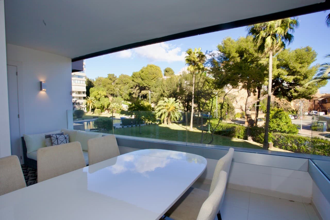 If you want to live in the place where others go on holidays, have a look at this stunning apartment! Right in the famous Puerto Portals, overlooking the marina with the million Euro yachts and close to the best restaurants and beaches! All this will be at your doorstep.

This very well kept and reformed 3 bedroom apartment is located on the first floor of this popular apartment development with direct port access to the marina and beach.

As you enter the property you will find the hallway that give access to each individual room of the apartment. The large main living room has is linked to the open plan kitchen and has direct access to its terrace with a table and a sitting area overlooking the pool, landscaped garden and marina.

The master bedroom has a double bed with a sliding door to the covered terrace. The other bedroom accessed from an internal hallway away from the living area has 2 individual beds with a window. In the hallway you will also have both separate bathrooms.

There are substantial communal gardens and a large swimming pool. N.b. The apartment, serviced by lifts.

Don't wait until someone else buys this beautiful property and call us now for a viewing!