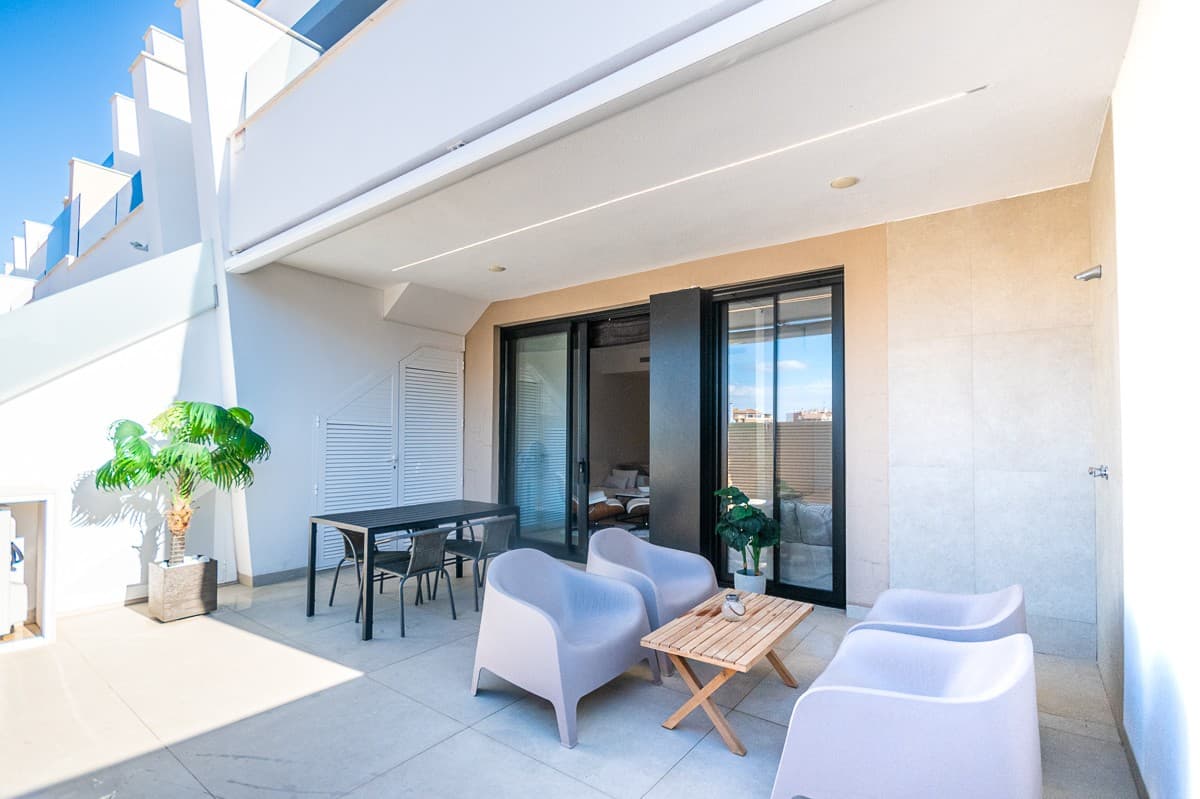 KEY READY ALL IN new 3 bedroom groundfloor bungalow from 2022!Located on walking distance of San Pedro Del Pinatar Center. 50 meters from the supermarket and restaurantsWe are very please to present you this wonderful ALL-IN and KEY READY ground floor apartment in San Pedro Del Pinatar, Murcia.Nestled in the charming coastal town of San Pedro Del Pinatar, this new ground floor bungalow apartment epitomizes a lifestyle of convenience and luxury. Situated within a short walk from essential amenities such as Consum, the vibrant weekly fresh market, and the bustling city center, this property boasts a prime location that ensures all your daily needs are just steps away.What sets this apartment apart is the extraordinary attention to detail and the extensive list of inclusions. From the moment you step inside, you'll be captivated by the high-end furniture and tasteful decoration that graces every room. Everything you see is yours to keep, creating an effortless move-in experience that is seldom found in the real estate market.The apartment itself features three spacious bedrooms and two well-appointed bathrooms, ensuring ample space for your family and guests. The open and airy layout seamlessly blends the living and dining areas, providing an ideal setting for relaxation and entertainment. Large windows flood the space with natural light, creating a warm and inviting atmosphere.The communal amenities are equally impressive. The heated pool offers year-round enjoyment, while the adjacent jacuzzi and jetstream provide the perfect way to unwind after a day of exploration. As an eco-conscious bonus, the property is equipped with solar panels that significantly reduce the community's monthly costs to an incredibly low €39.This ground floor bungalow apartment in San Pedro Del Pinatar is more than just a residence; it's a statement of refined living. With its unbeatable location, comprehensive list of inclusions, and communal features that promote relaxation and energy efficiency, it represents the epitome of modern convenience and comfort on the beautiful Spanish coast. Don't miss the opportunity to make it your new home and enjoy the best of what San Pedro Del Pinatar has to offer.AMAZING extra's that make this property your best choice:Only 3 years old and looks brand new-> Enjoy the benefits from a new built at 8% government tax instead of 10%Comes as you see it!! Full option + With furniture + with decoration -> Everything stays and is like new (except personal belongings)Conducted airconditioningWashingmachine Outside kitchenShutters and curtains Lots of storage space due to the many from top to bottom built-in closetsUnderfloor heating in the bathroomsHeated pool, Jacuzzi and jetstreamSuper low community costs!Luxurious finishes with a contemporary modern styleAnd so much more that you can discover on sight.Immediatly ready to move in! If you're looking for a ready to move in holiday property or a great investment to rent out. Then stop looking further and make your appointment now.