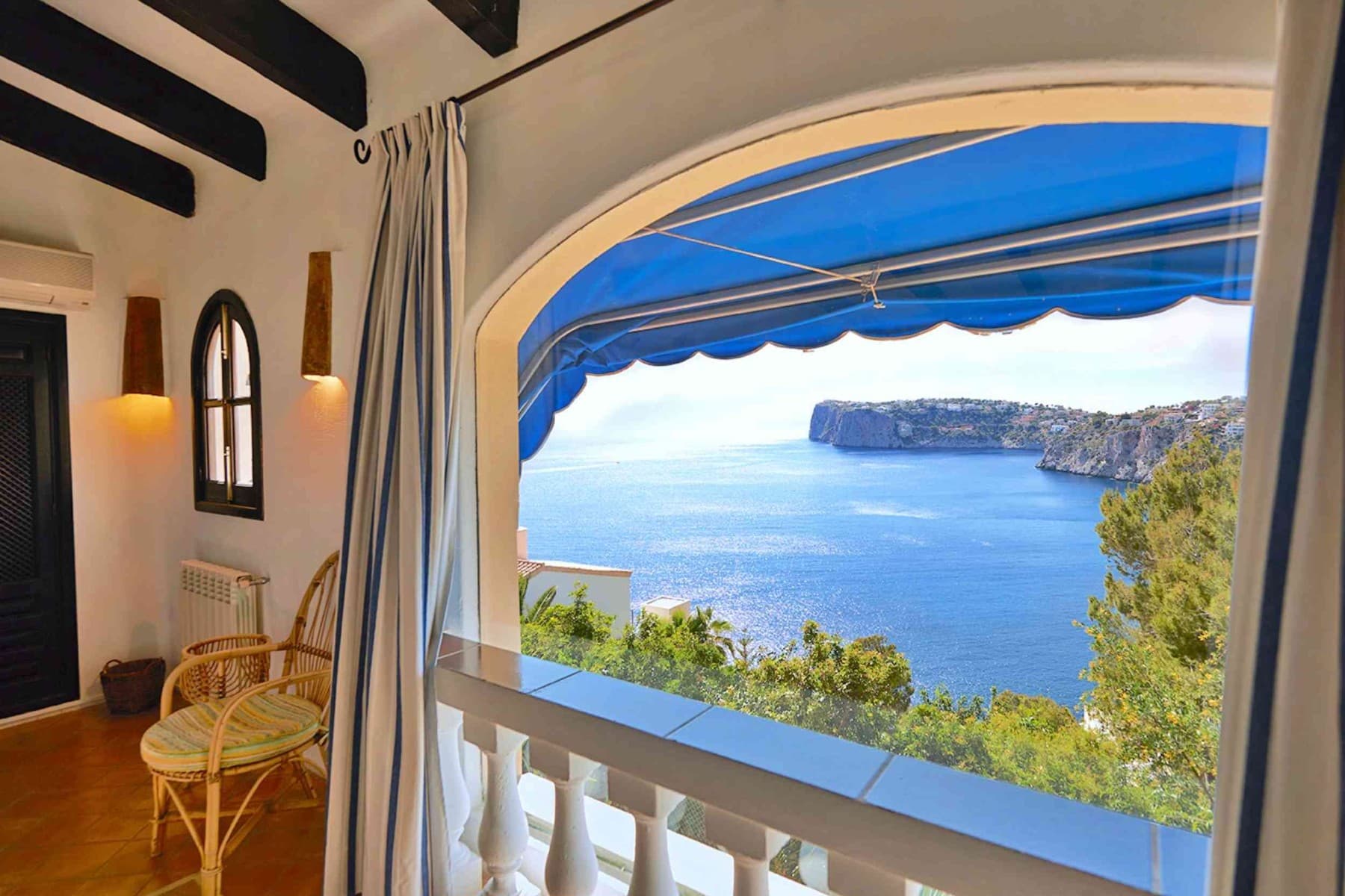 The Mediterranean villa with vacation rental license (ETV) offers on a constructed area of approx. 247m² (approx. 228m² constructed living space), concluded of two separate apartments with the following layout.

First floor apartment (approx. 150m²): Living room, dining area with fireplace, kitchen, 2 bedrooms, 1 bathroom, covered terrace, open terraces, sea views

Upper floor apartment (approx. 78m²): Living/dining room with fireplace, kitchen, 2 bedrooms, 1 bathroom, open terraces, sea view

Outdoor area: small swimming pool, large open and covered terraces, roof terrace, landscaped gardens, garage for 1 car

The property can be used in its current layout or the two floors can be connected with an internal staircase.

The neighboring house of a similar size can also be purchased. However, the neighboring house does not have a rental license.

Let us show you this special property now, in person or through an online viewing!