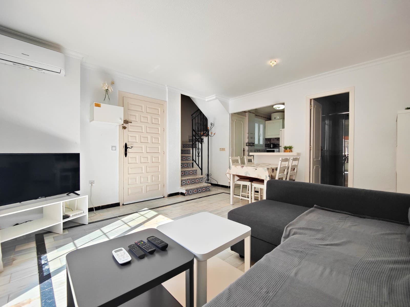 Immaculate duplex penthouse with private solarium for sale in La Mata, Torrevieja, just 200 metres from the beach and the seafront promenade. A fantastic opportunity to own a property near the sea in one of the most sought-after areas of the Southern Costa Blanca.This beautiful property is located in a private residential complex with landscaped gardens, decorative fountains and a communal swimming pool, offering a peaceful environment only a short walk from La Mata Beach, one of the best beaches in Torrevieja, and just a few minutes' walk from the central square of La Mata, with restaurants, shops and all amenities.The property offers a large living space, a good size terrace and an impressive private solarium of approximately 30 m², perfect for enjoying the Mediterranean sunshine all year round. Thanks to its south orientation, the apartment is very bright and ideal both as a permanent residence, holiday home or property investment in Torrevieja.The penthouse is in excellent condition and ready to move in. Features include new double-glazed windows, air conditioning in all rooms, a ceiling fan in the master bedroom and televisions in the bedrooms. It is sold fully furnished, including appliances, garden furniture and a brand-new parasol on the solariumIt's distributed over three levels:Main floorSpacious south-facing terrace with sea view, ideal for enjoying sunshine throughout the dayBright living and dining room with direct access to the terraceFully equipped open-plan kitchen with pantryRenovated full bathroomFirst floorTwo bedrooms with built-in wardrobesFull bathroomTop floor – SolariumLarge private solarium of approximately 30 m² with sea view, the ideal space for relaxing, sunbathing or outdoor dining.A great opportunity to buy a penthouse near the beach in La Mata, Torrevieja.