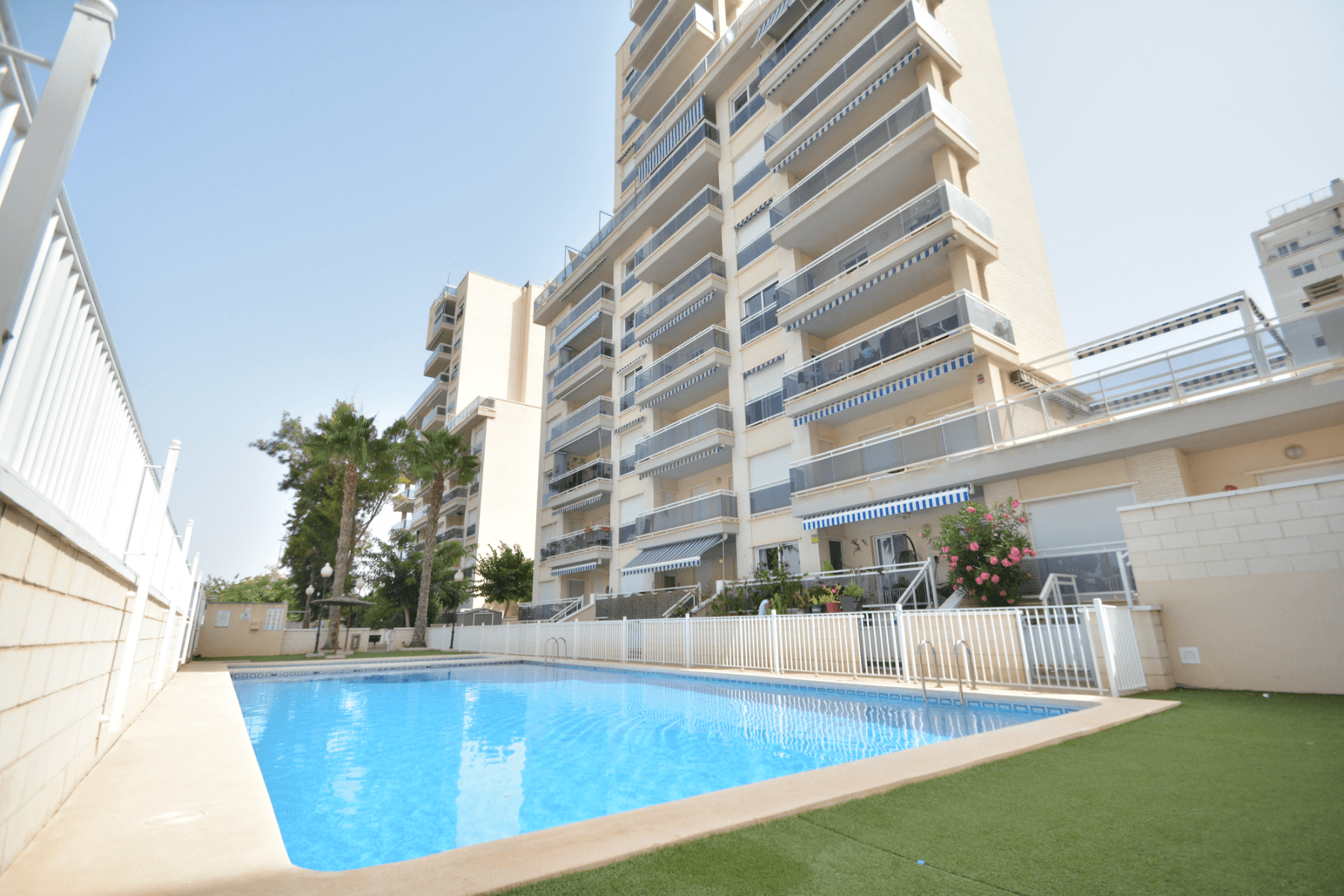This lovely apartment is located in the SUP7 area of Guardamar del Segura, a charming seaside town on the Costa Blanca known for its long sandy beaches, natural dunes, and a relaxed Mediterranean lifestyle. The property sits within a gated residential complex made up of two apartment blocks, offering a swimming pool, open-air parking, and a playground for children.

The home is on the 4th floor with elevator access and faces west, giving you open views of the Segura river and the green valley of Vega Baja that will never be blocked. With 70 m² of contracted area and 49 m² of usable space, it has been designed for both comfort and light. All rooms open onto a 10 m² terrace, which is perfect for relaxing and enjoying the excellent views. There is no interior patio, so the apartment feels bright and open throughout.

Inside, you will find a furnished home with two bedrooms and one bathroom. The master bedroom includes a built-in wardrobe, and the bathroom comes with a bathtub. The kitchen is open style, fully equipped with electric appliances, and has a handy utility room nearby. The terrace is fitted with an awning for shade, and in addition to the apartment, you also have a private storage room in the basement and your own allocated parking space in the complex.

The apartment has pre-installation for a ducted air conditioning system and has been very well cared for, used only as a summer residence and never rented. It is sold fully furnished, so you can move in and start enjoying it right away. Сommunal roof terrace available for all residents.

The location is excellent, just 1 km from the beach and the town center, and a short drive to Alicante city and Alicante airport.

This property is in very good condition and offers a fantastic opportunity to enjoy life by the sea. Taxes and purchase expenses are not included. Contact us today to arrange a viewing.