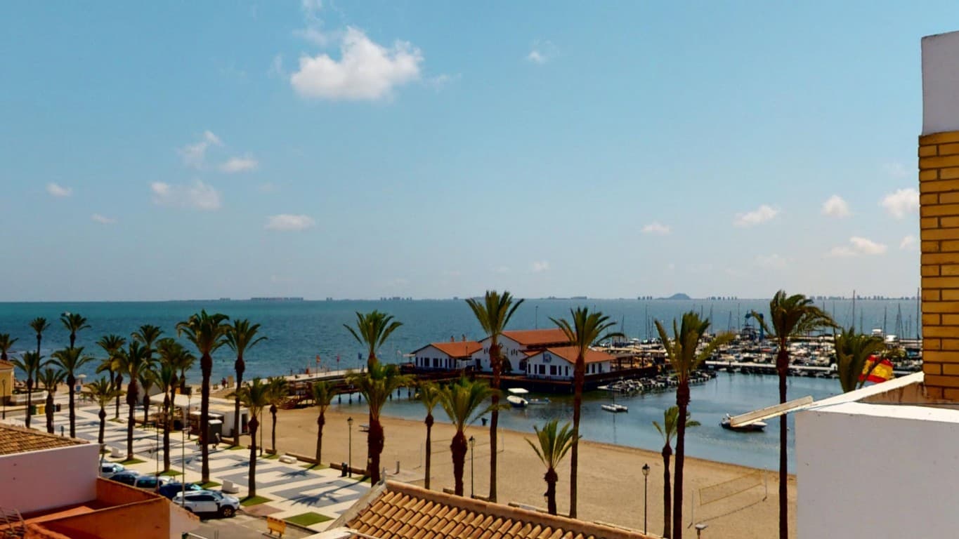 For Sale: Exclusive Apartment with Stunning Sea Views Overlooking the Marina of Los AlcázaresThis beautiful top-floor apartment on the fourth level offers a rare opportunity to own a truly unique piece of coastal living. Perfectly positioned right on the marina of Los Alcázares, it boasts breathtaking, uninterrupted views of the sea, the promenade, and the harbor. The apartment is accessible by lift and has been completely renovated, making it move-in ready and equipped with all modern comforts.Inside, the property features three spacious and bright bedrooms, a fully renovated bathroom, and a separate guest toilet with a laundry area and storage space. The smart layout and generous proportions make it ideal for both permanent residence and holiday use. What truly sets this apartment apart are the three large terraces, each offering spectacular views of the surrounding scenery — the perfect setting to enjoy the sun, sea breeze, and relaxed Mediterranean lifestyle at any time of day.The apartment is fitted with built-in air conditioning in all rooms, ensuring year-round comfort. Thanks to its location on the top floor, you’ll enjoy not only complete privacy and tranquility but also one of the best views available in the area.This is a unique chance to invest in an exceptional property on a prime location along the Spanish coast, where sea, sun, and quality of life come together. Don’t miss out — contact us today to arrange a viewing or request more information.