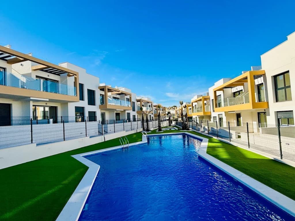 Beautiful modern penthouse with large roof terrace and views of the salt lakes.. Beautiful modern penthouse for sale with large roof terrace and views of the salt lakes.Ideal as an investment for a second home/holiday rental.This beautiful penthouse has two bedrooms, one with an en-suite bathroom and one with a separate bathroom. The bathrooms have underfloor heating. The kitchen is fully equipped with a combi-oven, hob, fridge, freezer, washing machine and dishwasher. Air conditioning and heating can be controlled separately in each room. The living room with lots of natural light has an adjoining terrace overlooking the two swimming pools, one of which is a children's pool. Electric shutters, intercom, secure front door, air conditioning, ventilation camera and alarm are also present.This penthouse has a large roof terrace with awning, barbecue, lounge, outdoor shower, storage box, sun loungers and dining table. In short, everything you need to enjoy the beautiful view from the lounge with a delicious cocktail, delicious tapas at the large dining table under the pergola or from the sun loungers under the parasol.The penthouse has a private parking space .The residence is a gated complex with 40 apartments and is a low-rise building located on a hill in a beautiful residential area.The many beautiful beaches are less than a 10-minute drive away. Of course, there are also local shops, restaurants, bars and supermarkets within walking distance of your home. It takes just over five minutes to drive to the La Zenia Boulevard shopping centre, which offers 80,000 m² of shops, supermarkets, restaurants and terraces. You will certainly not be bored here.This property is five minutes from the Villamartín golf course and less than 5 km away you will find two other challenging 18-hole golf courses: Real Club de Golf de Campoamor and Las Ramblas Golf.Perfect for investment property and immediately rentable!