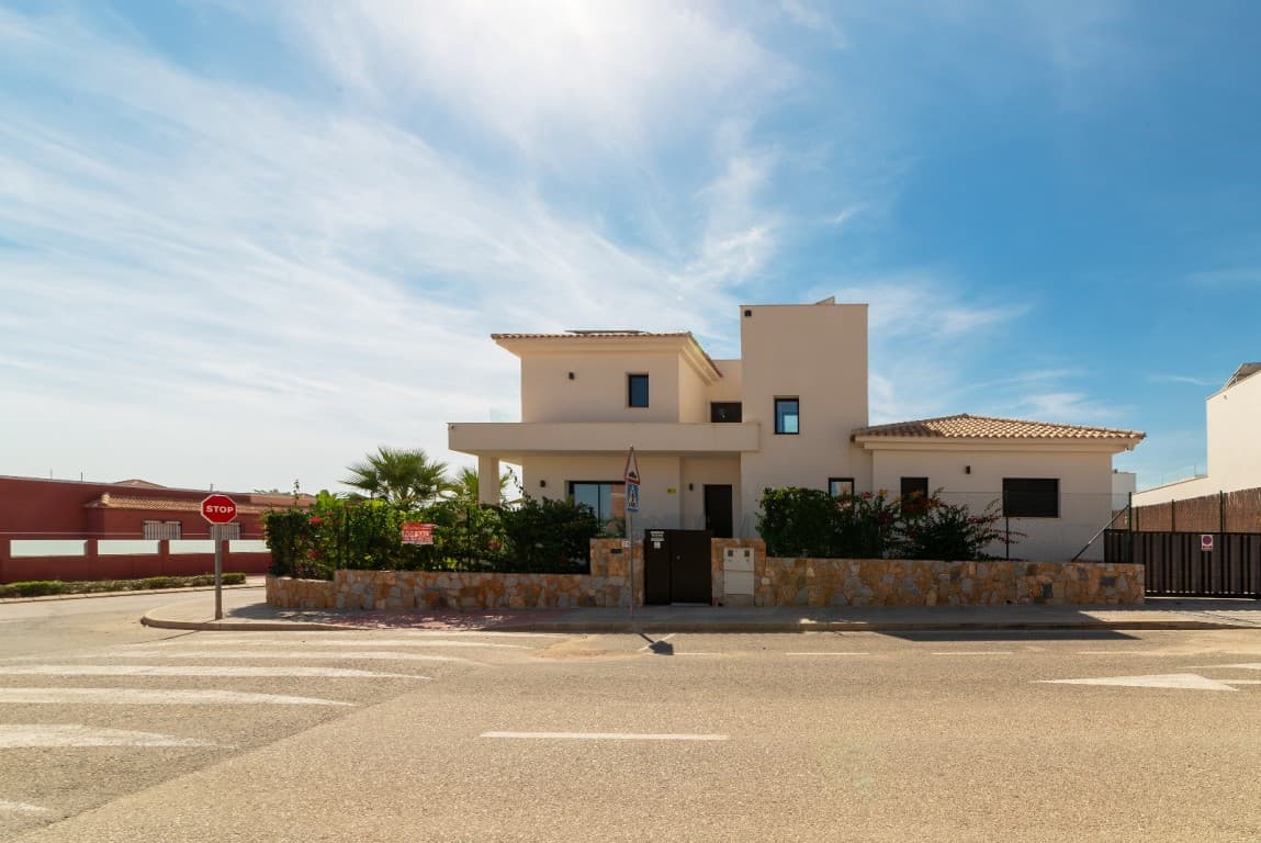 luxury villa with 4 bedrooms and elevator. This beautiful dream villa in Los Montesinos on the Costa Blanca, where luxury and space offer an unparalleled living experience. This detached villa with private garden offers considerably more space than comparable properties on the market, making it a unique opportunity for those seeking comfort and space.Upon entering the villa, you will find a hall with a wardrobe. To the left is the dining and living room, which also features a spacious open kitchen with a beautiful view of the pool and covered terrace where you can enjoy warm summer days. The kitchen has a very large refrigerator and freezer, which is neatly concealed. There are two combination ovens with microwave, induction hob, dishwasher, in short, everything you need. Large windows provide plenty of natural light and create a warm and inviting atmosphere. Behind the kitchen is the laundry room. On the ground floor, there are three spacious bedrooms and two bathrooms, one of which is en suite. All bathrooms have underfloor heating. This beautiful villa has an elevator with a telephone, making every floor easily accessible for everyone. The house is also wheelchair friendly.On the first floor, there is another very spacious bedroom with an en-suite bathroom and a dressing room. There is also a storage room with a safe. From the bedroom, you have access to the 40 m² solarium with views of the private terrace and the surrounding area, including the salt lake of Torrevieja.The basement features a spacious 45 m² living room, a storage room, and an 84 m² garage with ample space for several cars.This luxury villa has been built with high-quality materials and offers durability, elegance, and maximum energy efficiency. Hot and cold air conditioning is available throughout. The villa has 14 solar panels. The spacious indoor and outdoor areas set this property apart from the competition, allowing you to enjoy your new home to the fullest.Within walking distance of the supermarket, restaurants, and bars. In Los Montesinos, you will find the beautiful square next to the town hall, where you can soak up the authentic Spanish atmosphere. A short drive takes you to Torrevieja, Ciudad Quesada, or the beautiful sandy beaches of La Mata.