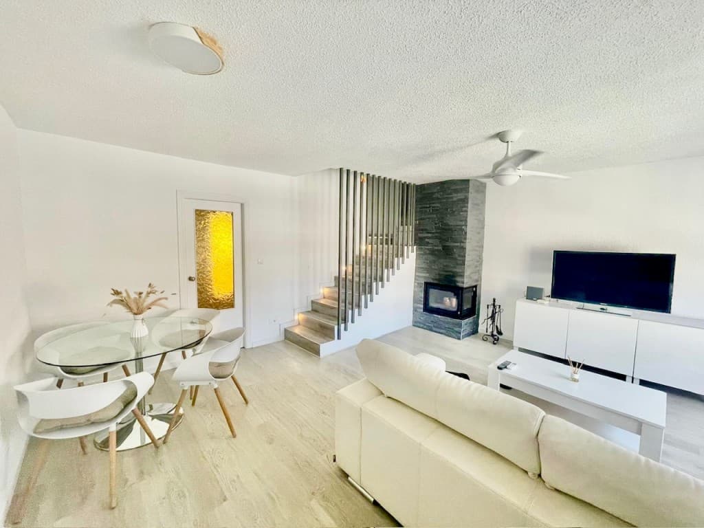 Charming 4-Bedroom, 2-Bathroom Townhouse in Calabardina, Murcia. This delightful townhouse is nestled in the picturesque coastal town of Calabardina, Murcia. This property is perfect for families or investors looking for a vacation rental opportunity. There are four well-appointed bedrooms on the first floor, including three spacious double bedrooms with built-in wardrobes and one cozy single bedroom.The double bedrooms include:o One double bedroom with two single beds.o Two king-size bedrooms for a luxurious night's sleep.o A single bedroom with a divan bed that converts into a king-size bed, ideal for accommodating extra guests.The property boasts two modern bathrooms equipped with walk-in showers, with one located upstairs and the other downstairs for convenience.The 30 sqm north-facing lounge that seamlessly blends with a dining area, featuring a modern log burner for warmth during the cooler months. Additional cooling comes from an A/C unit and ceiling fan, ensuring a comfortable environment year-round.The fully equipped kitchen that opens onto a spacious 20 sqm terrace, ideal for family gatherings, complete with a stone barbecue for outdoor cooking.In addition there is a 16 sqm terrace on the north side, providing a cooler dining option during the summer.A delightful 20 sqm rooftop terrace that boasts breathtaking views of the sea and mountains. This inviting space features installed solar panels for energy efficiency, complemented by a convenient storage room for all your needs.The property includes a private underground garage (approx. 40 sqm) with direct access to the house via internal stairs.There is a communal pool.The townhouse is conveniently located just a 2-minute walk from the beach and within a 5-10 minute walk to local bars, restaurants, pharmacies, and supermarkets.The main town of Águilas is only a 10-minute drive awayThe property has been successfully operated as an Airbnb during summer season, It has also been rented out long term during low season.The sale includes the existing tourist license, allowing for a seamless transition for the new owner to continue the vacation rental business if required.Viewing is highly recommended to appreciate all this property has to offer.