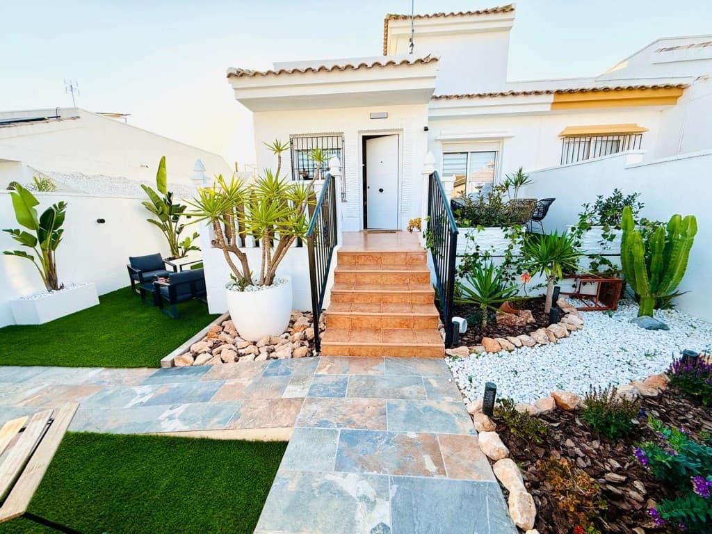 Stunning South Facing Fully Upgraded 3 Bedroom 2 Bathroom Villa. STUNNING SOUTH FACING FULLY UPGRADED 3 BEDROOM 2 BATHROOM VILLA IN SUCINAThis exceptional villa is offered fully furnished and completely key ready, including high-quality furniture and stylish furnishings throughout — simply arrive with your suitcases and immediately begin enjoying the luxury Mediterranean lifestyle.Located within one of Sucina’s most popular urbanisations, this beautifully upgraded south-facing villa offers stylish living just a short stroll from the heart of the village.The property enjoys an excellent position within walking distance of Sucina village centre, where you will find an abundance of bars, restaurants, cafés, shops, and everyday amenities, making it ideal for both permanent living and holiday enjoyment.On entering through the gate with newly built rendered white walls, you can immediately appreciate the incredible time, care, and attention the current owners have invested in transforming this property into a truly beautiful home.The generous landscaped garden has been thoughtfully designed with beautiful Mediterranean plants, upgraded paving, a feature pizza oven, hard wired remote control colour changing lighting and astro turf extending along the side of the villa — creating a fantastic outdoor living space perfect for dining, entertaining, sunbathing, or even installing a great-sized swimming pool if desired.The villa also benefits from two additional terrace areas, ideal for relaxing with a café con leche in the morning or enjoying a glass of vino while soaking up the sunshine and entertaining family and friends.Fully upgraded throughout, the villa offers bright and spacious accommodation with a wonderful flow between the indoor and outdoor living spaces. The south-facing orientation ensures sunshine throughout the day, creating the perfect setting for relaxing, entertaining, and enjoying the Spanish lifestyle all year round.At the heart of the home is a large open-plan kitchen, lounge, and dining area featuring modern fitted units, quality appliances, upgraded flooring throughout, air conditioning, night and day window blinds and 2 modern extractor fan lights, creating a stylish contemporary living space filled with natural light.The villa features 3 spacious light filled bedrooms and 2 beautifully modernised bathrooms. The downstairs bathroom has been finished to a high standard and includes a sleek large walk-in shower with luxury rainfall shower fittings, a stylish dual vanity unit with twin basins, contemporary mirror, WC, and upgraded modern lighting, creating a luxurious hotel-style feel.There are 2 ground floor bedrooms, including a spacious master bedroom with air conditioning, fitted white sliding wardrobe, modern ceiling extractor fan light, sliding patio doors with night and day blinds opening out onto the beautifully maintained private garden, allowing plenty of natural light and creating a wonderful indoor-outdoor living atmosphere.The second rear bedroom is bright and airy and benefits from fitted white wardrobes, modern extractor fan lighting, air conditioning, and a window with stylish day and night blind, creating a fresh contemporary finish throughout.Outside, the property benefits from an enclosed ground floor terrace finished with beautiful tiling and a useful storage area housing the washing machine. Stairs lead up to the impressive private solarium terrace, where you will find the separate third bedroom with en-suite bathroom.This upper-level suite offers air conditioning and a modern en-suite bathroom complete with shower cubicle, window, and stylish day and night blinds. The spacious solarium terrace has been finished with astro turf and fantastic colour-changing outdoor lighting, creating the perfect space for sunbathing, entertaining guests, or even installing a jacuzzi to fully enjoy the Mediterranean lifestyle.Ideally located for exploring everything the Costa Cálida has to offer, the property is just: • 20 minutes from Murcia International Airport • Approximately 55 minutes from Alicante Airport • Only 15 minutes from the beautiful beaches of the Mar MenorThe historic cities of Murcia and Cartagena, numerous golf courses, marinas, shopping centres, and stunning Mediterranean coastline are all within easy reach.Whether you are searching for a permanent residence, luxury holiday home, or investment opportunity in the sun, this exceptional villa offers location, lifestyle, and comfort in equal measure.