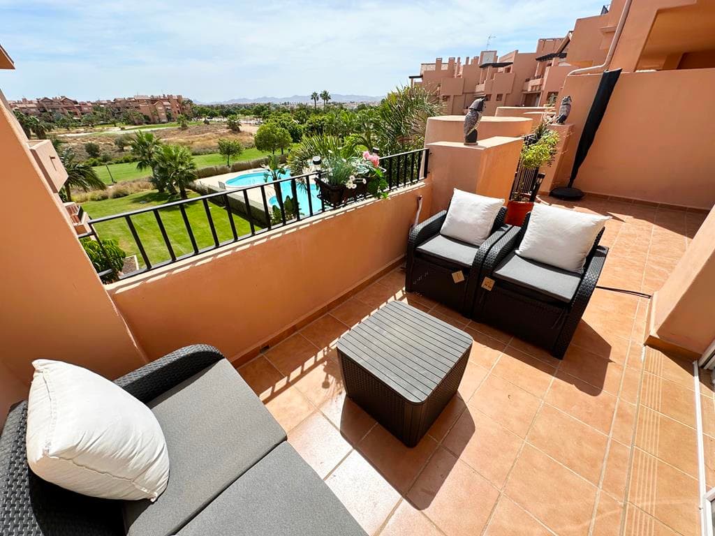 We are thrilled to exclusively offer this fantastic three bedroom two bathroom second floor apartment for sale on the Mar Menor Golf Resort.  The property is being sold furnished with hot and cold aircon throughout and allocated underground parking with lift access to the property.  The apartment is in a great location, a very well maintained block overlooking one of the resorts swimming pools and views over the golf course and surrounding countryside.  The owners have made some improvements to the property and it is extremely well maintained.  There is an onsite supermarket, the MMGR club with padel, gym, restaurant and mini golf, ONA hotel and clubhouse and an array of great restaurants just outside the resort on the boulevard, all are walking distance from the property. The Mar Menor beach town of Los Alcazares is a short 8 minutes drive away, Murcia airport 20 minutes and Alicante an hours drive.This fantastic property comprises an large open plan kitchen, dining and living room.  The fully equipped kitchen has a new oven and hob and the owners installed a new heater in February this year.  The spacious sunny lounge diner has patio door access on to the huge terrace where you can enjoy views over one of the resorts communal pools and the golf course.  The property had three double bedrooms all with fitted wardrobes.  The master has an ensuite bathroom with newly fitted walk in shower and patio door access to the main terrace.  The second guest bedroom is a really sunny room with aspects over the resort and the third bedroom has access to its own terrace.  There is a separate family shower room.  The allocated parking space has a large double aluminium built storage shed, perfect for golf clubs, bikes and beach chairs.  All windows have fly screens and the property had new aircon installed back in July 2021.  This is a fabulous property really well looked after by the owners.  Contact us to book a viewing appointment.