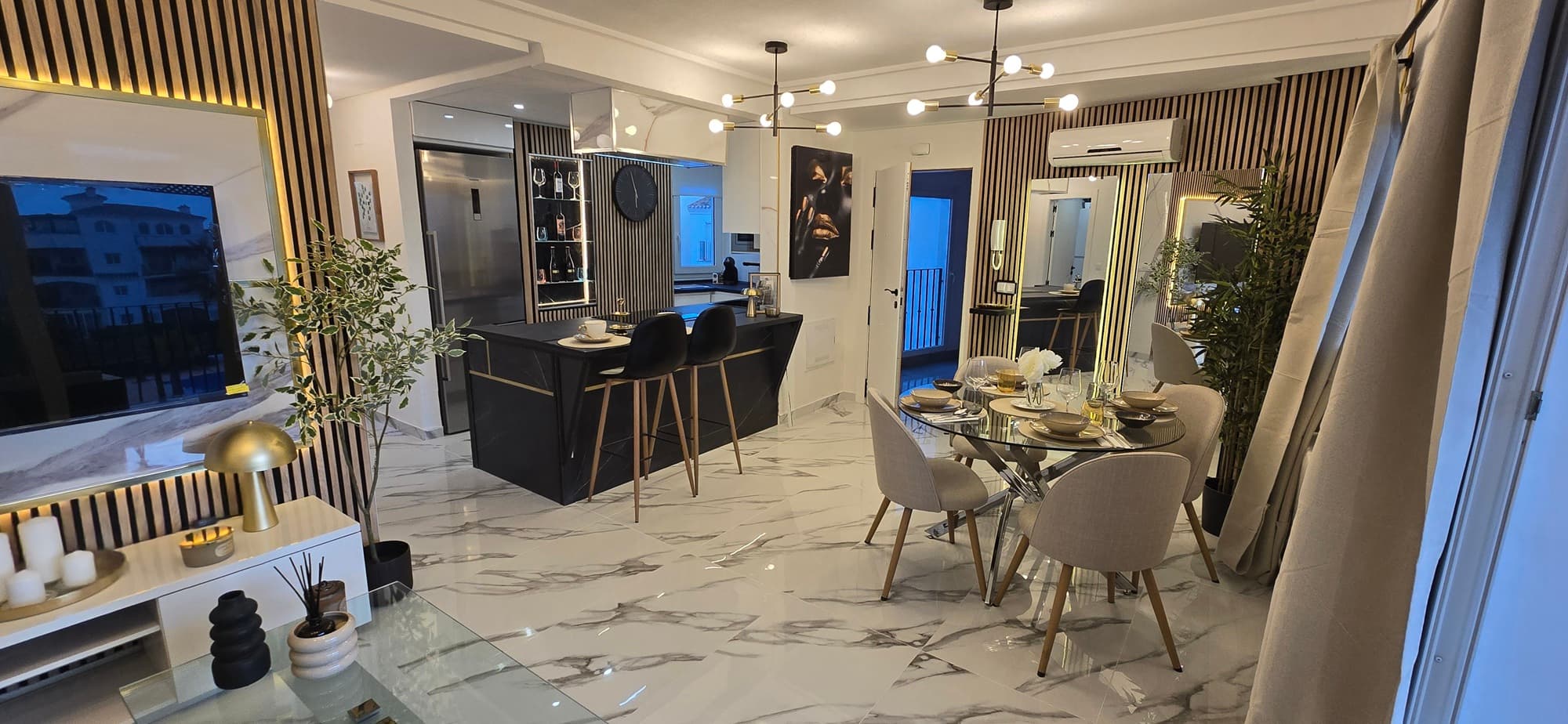 A fantastic opportunity to buy a fully modernised second floor apartment located in a great spot close to the clubhouse on Hacienda Riquelme Golf Resort in the Region of Murcia.The owner has upgraded everything in the apartment, including the floors, kitchen which is now open plan and re-fitted, new bathroom and so on. This stunning apartment must be seen to be appreciated! In brief, the apartment comprises an open-plan living room with media wall and sliding doors opening to a West facing terrace overlooking the pool. The kitchen is new and includes all the appliances. There are two double bedrooms with fitted wardrobes, ceiling fans and juliet balconies, plus a re-fitted bathroom.The apartment is being sold as seen, with furniture included and comes with a secure parking space in the underground garage (there is a lift to all floors). If you are looking for a property ready to move into - make sure you take a look at this one!