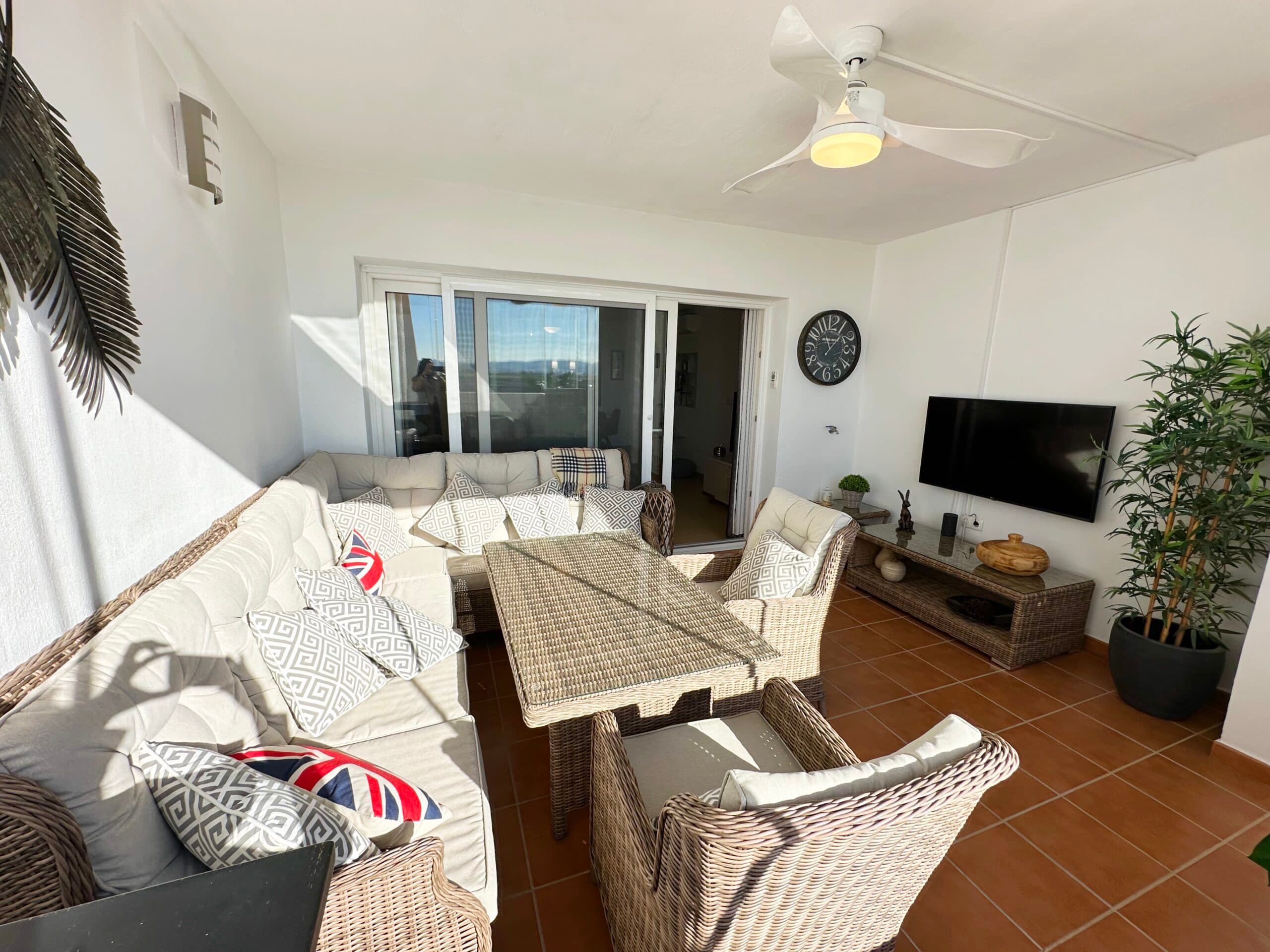 We are thrilled to offer this splendid three bedroom south facing apartment on La Goleta just outside Mar Menor Golf Resort.  The apartment is in a prime location close to the bars and restaurants on the Boulevard and a 5 minutes walk to the resorts supermarket and MMGR club with padel, gym, mini golf and restaurant.  The apartment features several upgrades including glass curtains on the terrace and a walk in shower in the ensuite to the master bedroom.  The property is being sold furnished and has aircon in the lounge and two of the bedrooms and mosquito blinds on all doors. This property does not have access to the communal pools of MM2 but you can take a membership at the MMGR club to use their pool which is also heated for all year use.The property is accessed via a security lift to the second floor.  You enter in to the sunny open plan lounge diner with kitchen to the left.  The owners have updated the kitchen with new work tops, oven, hob and sink and enclosed the separate utility room.  The sunny lounge diner has access to a fantastic terrace where the owners have added glass curtains creating a wonderful year round use space.  The curtains can be opened up in the summer.  Here you can enjoy views over the countryside. There are three double bedrooms all with fitted wardrobes.  The master has an ensuite shower room and access to the terrace.  You will also find a separate guest bathroom.  The owners have added a door from the lounge to the bedrooms giving more privacy and warmth.  This is a very well maintained and beautifully presented apartment with high quality furnishings.  Please contact us to book a viewing appointment.