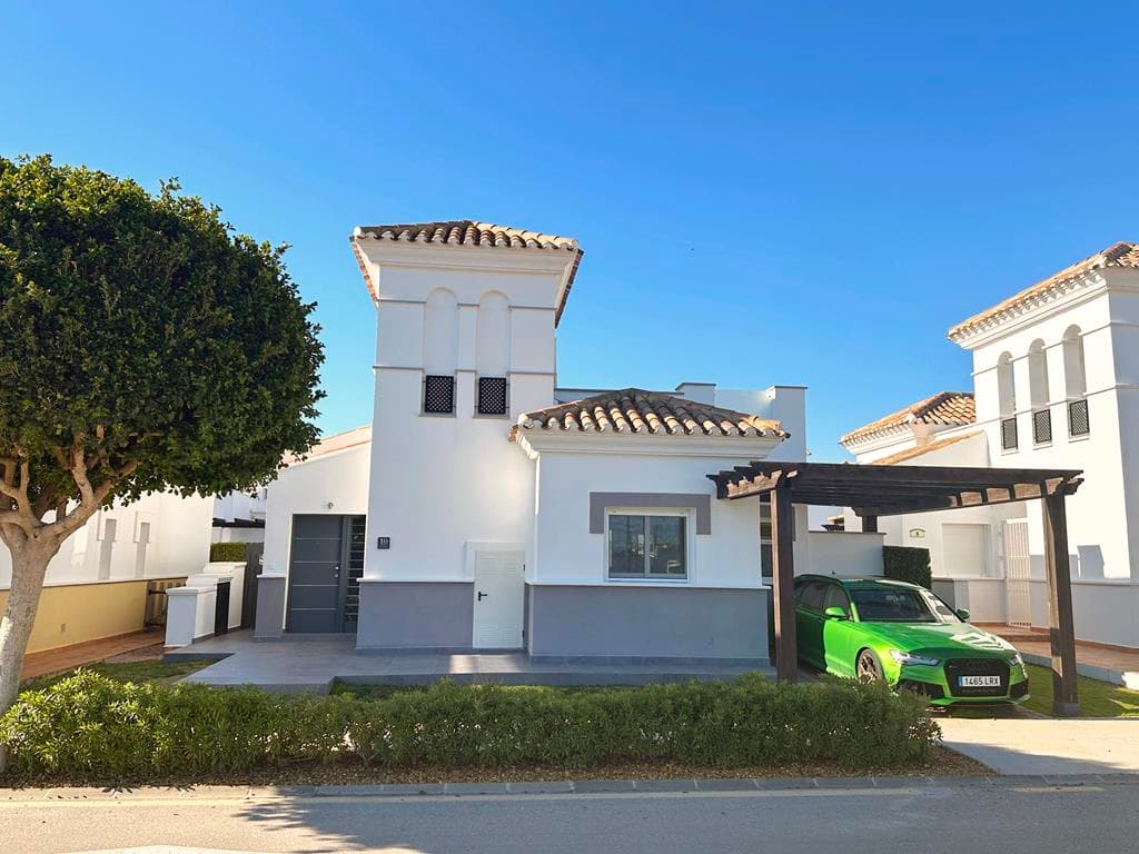 WOW! This villa has to be viewed.  We are thrilled to offer this fully modernised Acebuche villa for sale on the wonderful La Torre Golf Resort.  No expense has been spared with this property.  The owners have extended the entrance area, added a storage room upstairs, fully retiled the solarium and added frosted privacy glass, opened up the living space with a brand new kitchen, new bathroom, rear tiled terrace with covered pergola and outdoor kitchen area, a huge shed (the perfect man cave!) and all new floorings and aircon throughout.  The garden has plenty of space to add a private swimming pool. The property is situated close to the Kings College entrance of the resort and close to one of the communal swimming pools.  Murcia airport is ten minutes drive along with the local village of Roldan.  Onsite you have a supermarket and various bars and restaurants in the resorts town centre.The property has off road parking and an spacious storage cupboard to the front of the property.  The stairs have been incorporated into the property and are situated to the right of the hallway with  large storage cupboard at the top of the stairs and glazed patio access onto the tiled terrace where you can enjoy gorgeous views over the orange groves and amazing sunrises.  The living space and kitchen have been opened up to create a more sociable living space with brand new kitchen and breakfast bar with built in oven, hob and microwave.  Patio doors lead to the tiled terrace and lawned garden.  To the left of the garden is an outdoor kitchen area with gas bbq and to the right a huge shed with tiled roof.  There are two double bedrooms both with fitted wardrobes and a separate family bathroom with walk in shower.  There is brand new aircon throughout, flyscreens on all doors and windows and a large storage cupboard in the living room.  This is a gem of a villa, the current owners have refurbished the property entirely.  Please contact us for a viewing appointment.